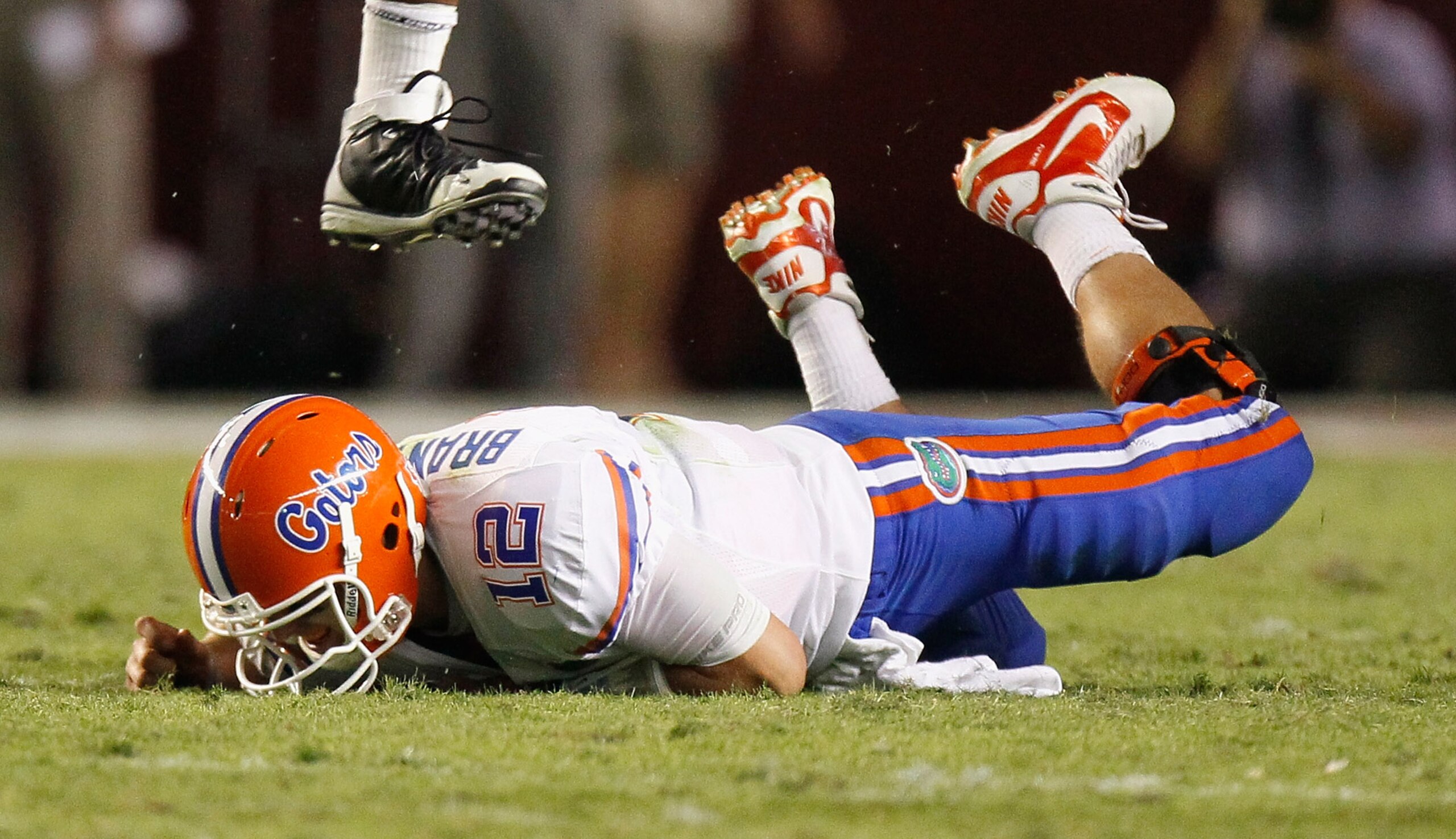 TUSCALOOSA, AL - OCTOBER 02: Quarterback John Brantley #12 of the Florida Gators falls to the ground after being pressured by the Alabama Crimson Tide at Bryant-Denny Stadium on October 2, 2010 in Tuscaloosa, Alabama. (Photo by Kevin C. Cox/Getty Images TUSCALOOSA, AL - OCTOBER 02: Quarterback John Brantley #12 of the Florida Gators falls to the ground after being pressured by the Alabama Crimson Tide at Bryant-Denny Stadium on October 2, 2010 in Tuscaloosa, Alabama. (Photo by Kevin C. Cox/Getty Images