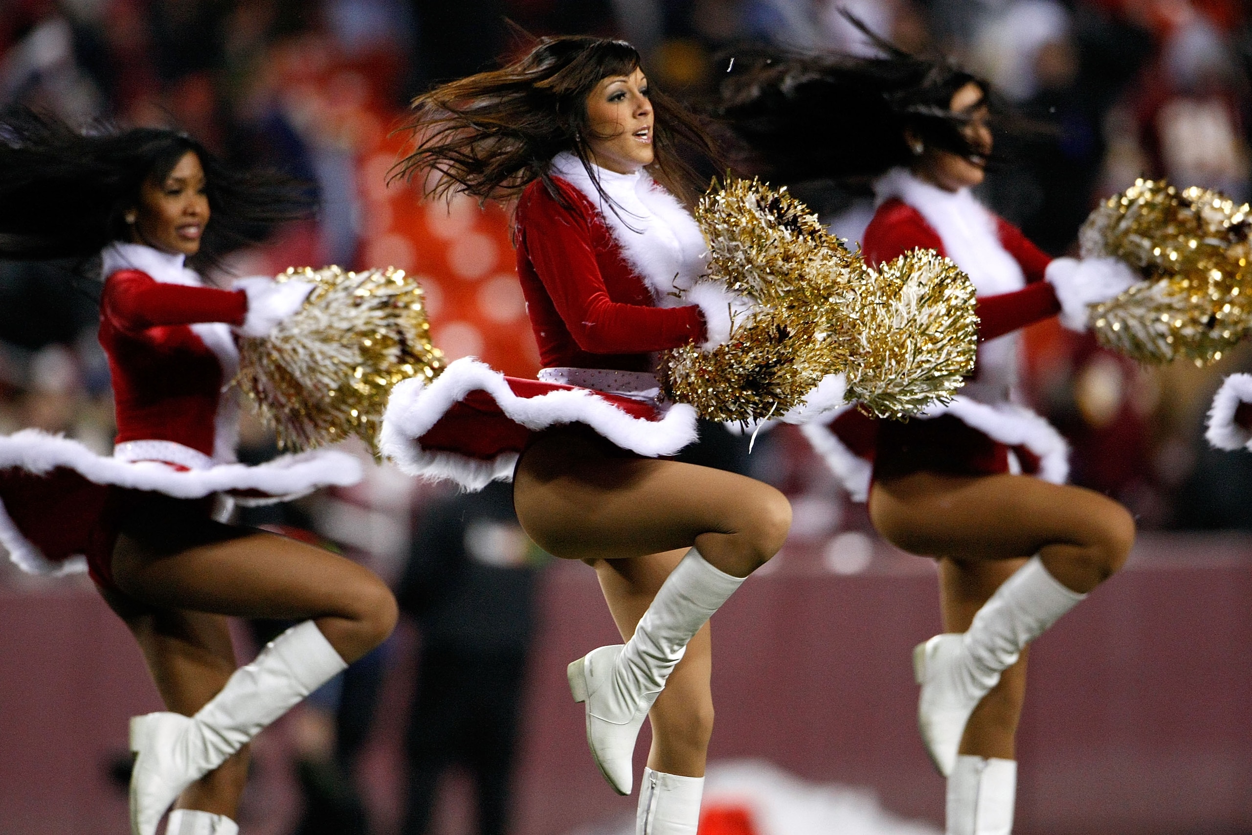 LANDOVER, MD - DECEMBER 06:  Washington Redskins cheerleaders perform in Christmas costumes during halftime in a game against the Chicago Bears at FedEx Field December 6, 2007 in Landover, Maryland. The Redskins won the game 24-16.  (Photo by Win McNamee/
