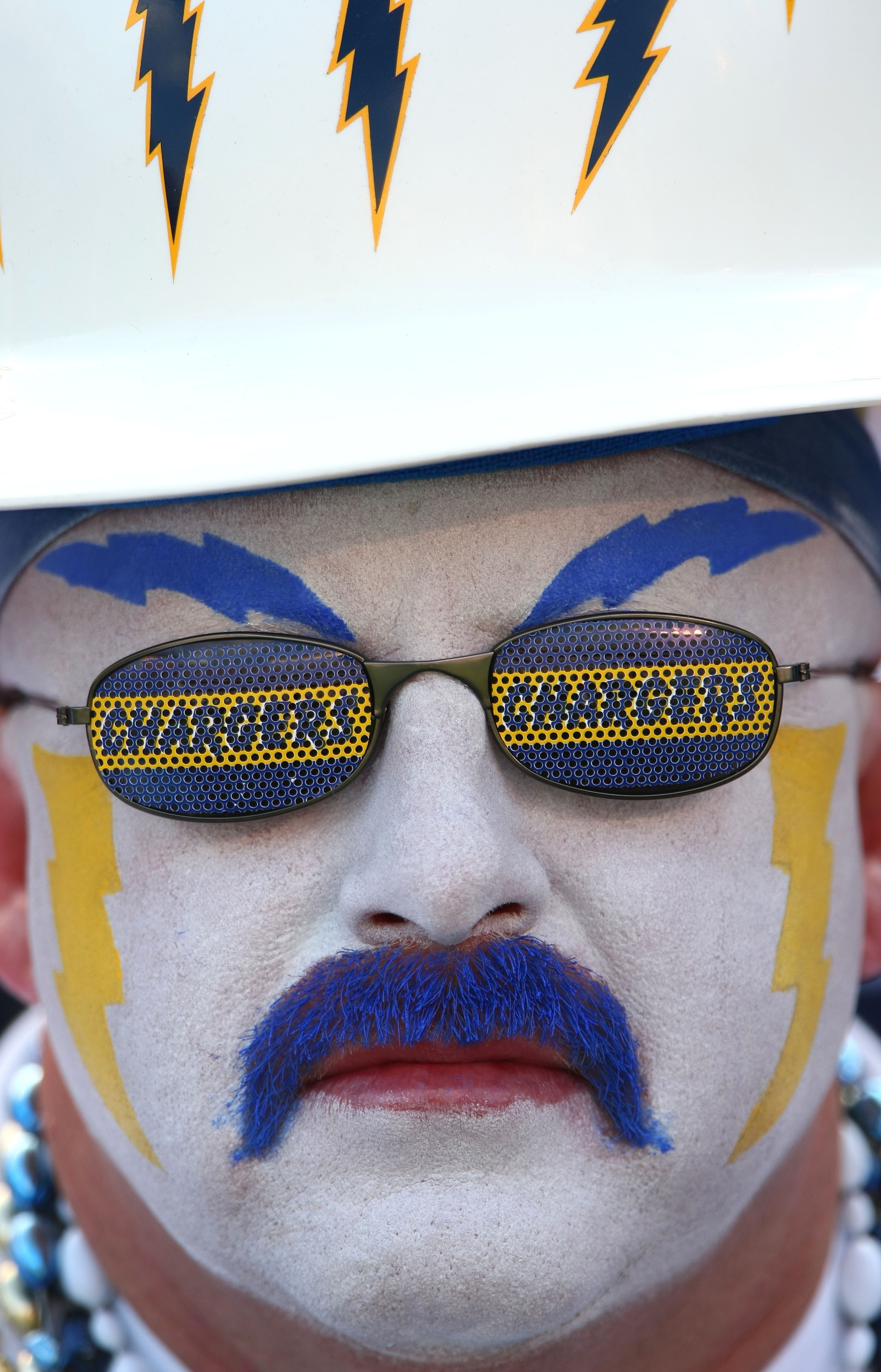 SAN DIEGO - OCTOBER 14:  A San Diego Chargers Fan looks on against the Oakland Raiders during the 2nd half of their NFL game on October 14, 2007 at Qualcomm Stadium in San Diego, California.  (Photo by Donald Miralle/Getty Images)