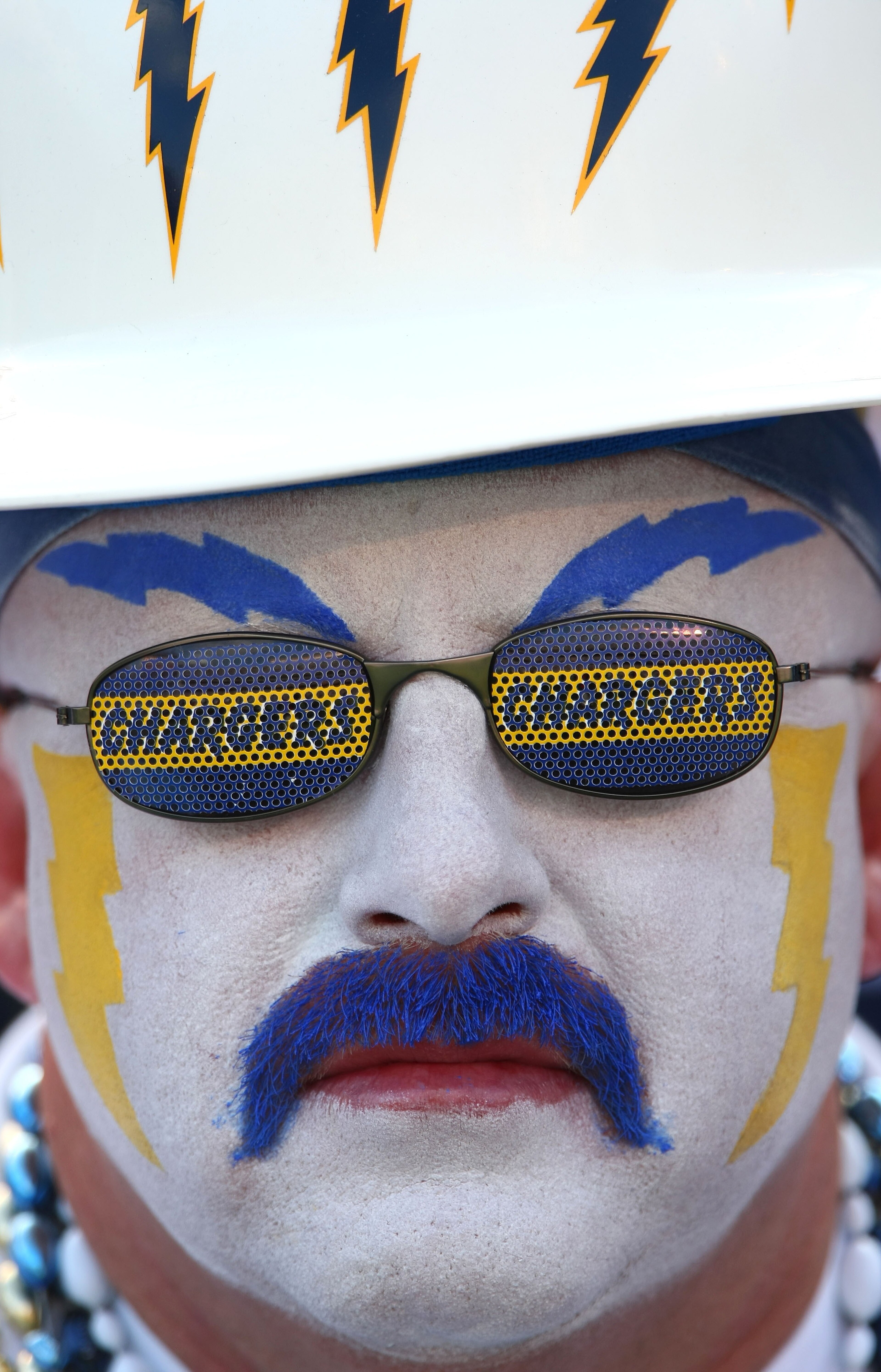 SAN DIEGO - OCTOBER 14: A San Diego Chargers Fan looks on against the Oakland Raiders during the 2nd half of their NFL game on October 14, 2007 at Qualcomm Stadium in San Diego, California. (Photo by Donald Miralle/Getty Images) SAN DIEGO - OCTOBER 14: A San Diego Chargers Fan looks on against the Oakland Raiders during the 2nd half of their NFL game on October 14, 2007 at Qualcomm Stadium in San Diego, California. (Photo by Donald Miralle/Getty Images)