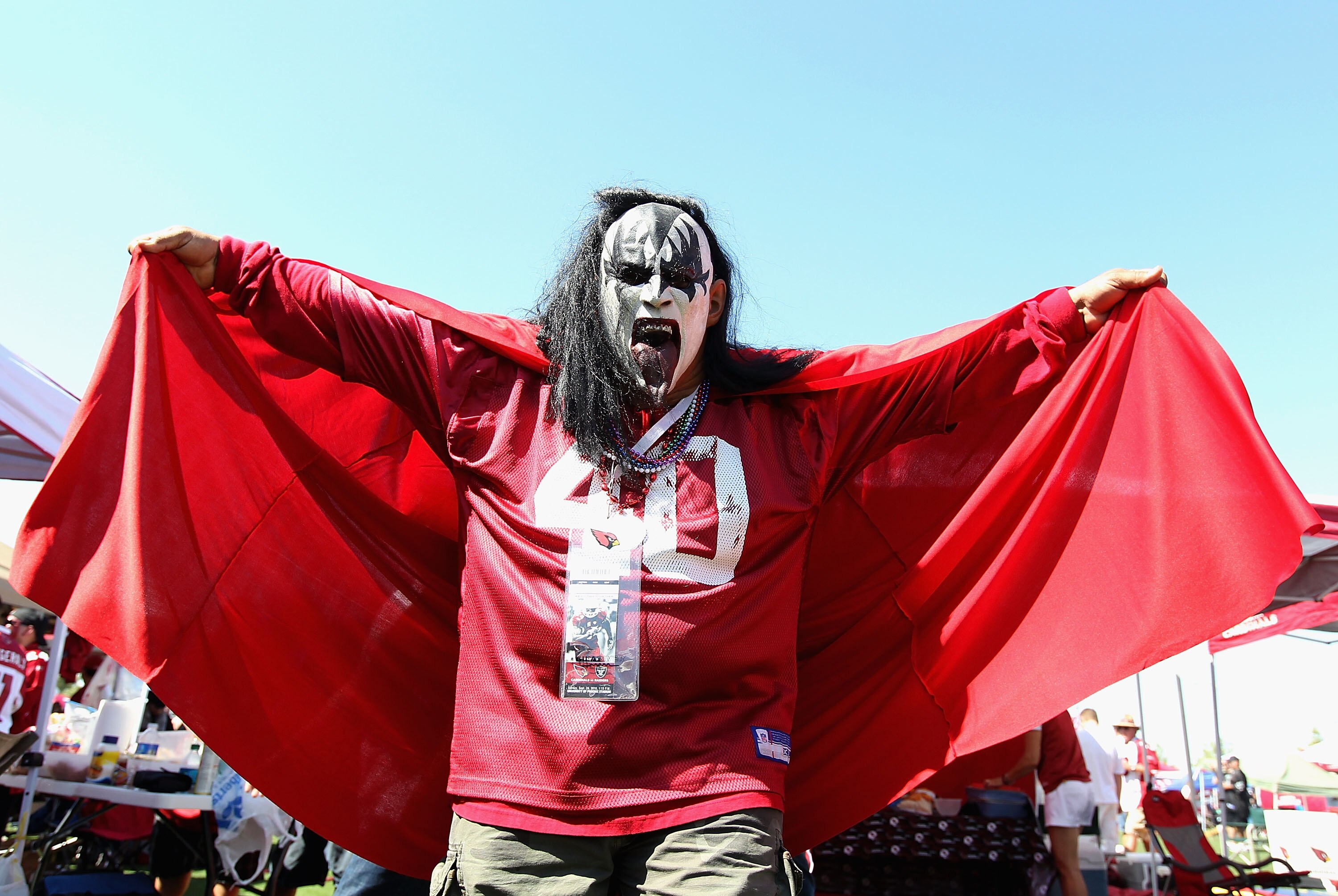 GLENDALE, AZ - SEPTEMBER 26:   A fan of the Arizona Cardinals wearing a 'Kiss' mask poses before the NFL game against the Oakland Raiders at the University of Phoenix Stadium on September 26, 2010 in Glendale, Arizona.  (Photo by Christian Petersen/Getty