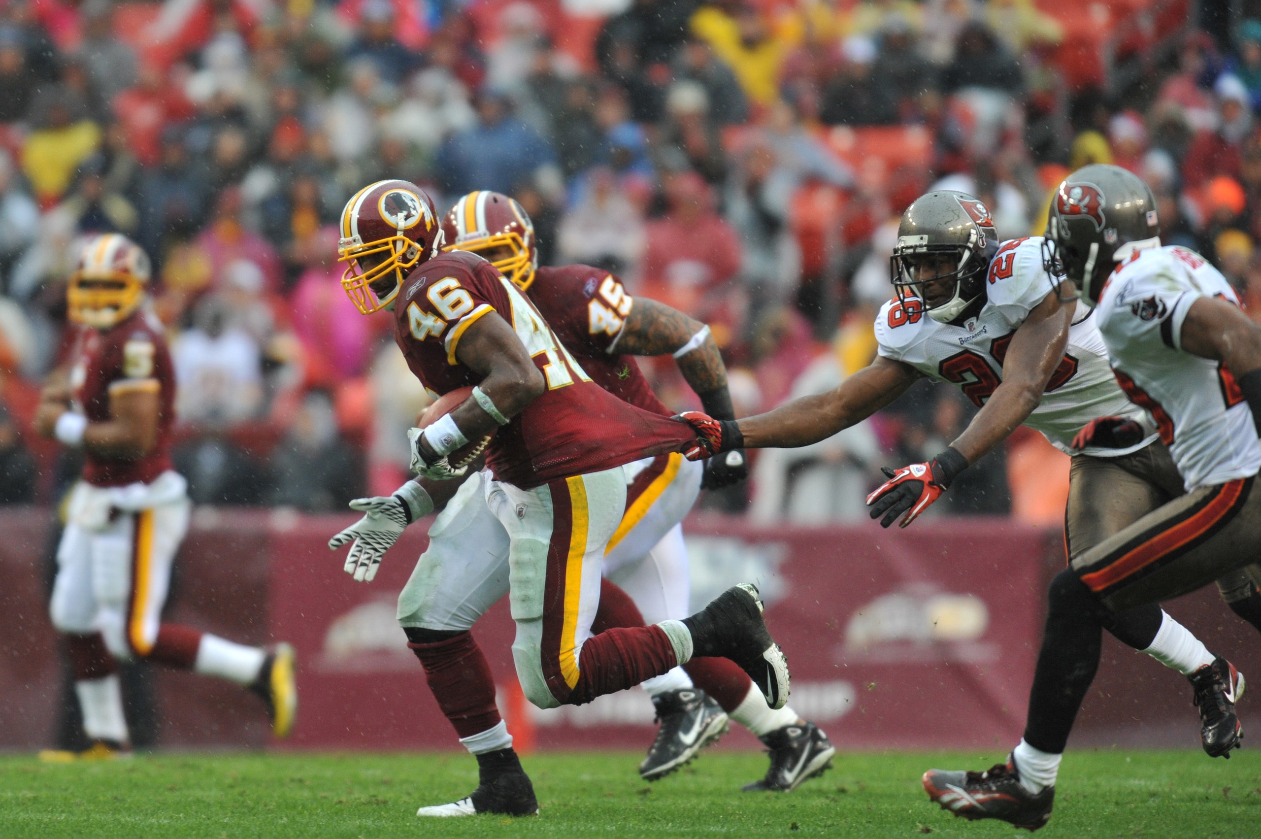 LANDOVER, MD - DECEMBER 12:  Ryan Torain #46 of the Washington Redskins runs the ball against the Tampa Bay Buccaneers  at FedExField on December 12, 2010 in Landover, Maryland. The Buccaneers defeated the Redskins 17-16. (Photo by Larry French/Getty Imag