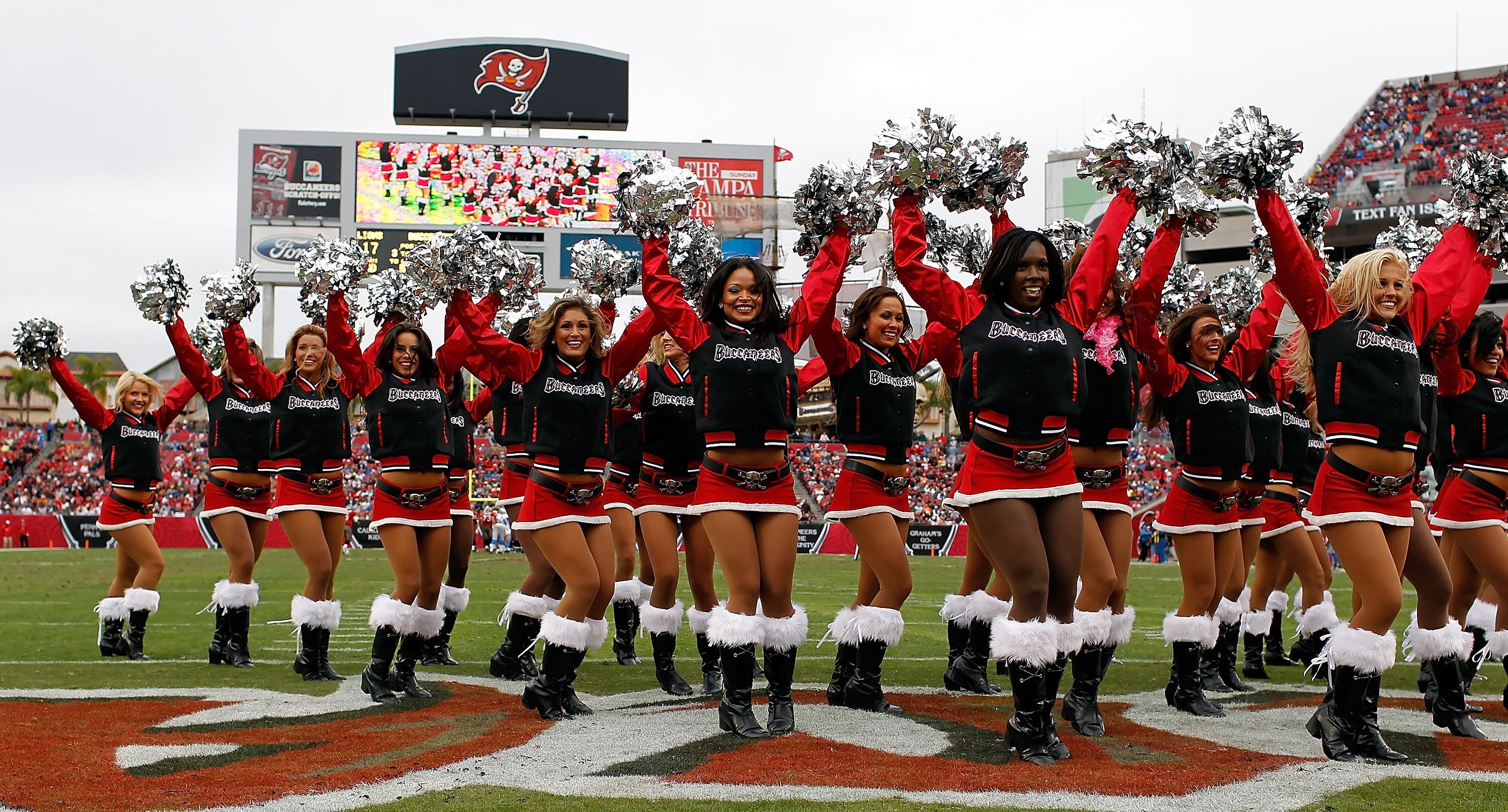 TAMPA, FL - DECEMBER 19:  Cheerleaders of the Tampa Bay Buccaneers perform during the game against the Detroit Lions at Raymond James Stadium on December 19, 2010 in Tampa, Florida.  (Photo by J. Meric/Getty Images)