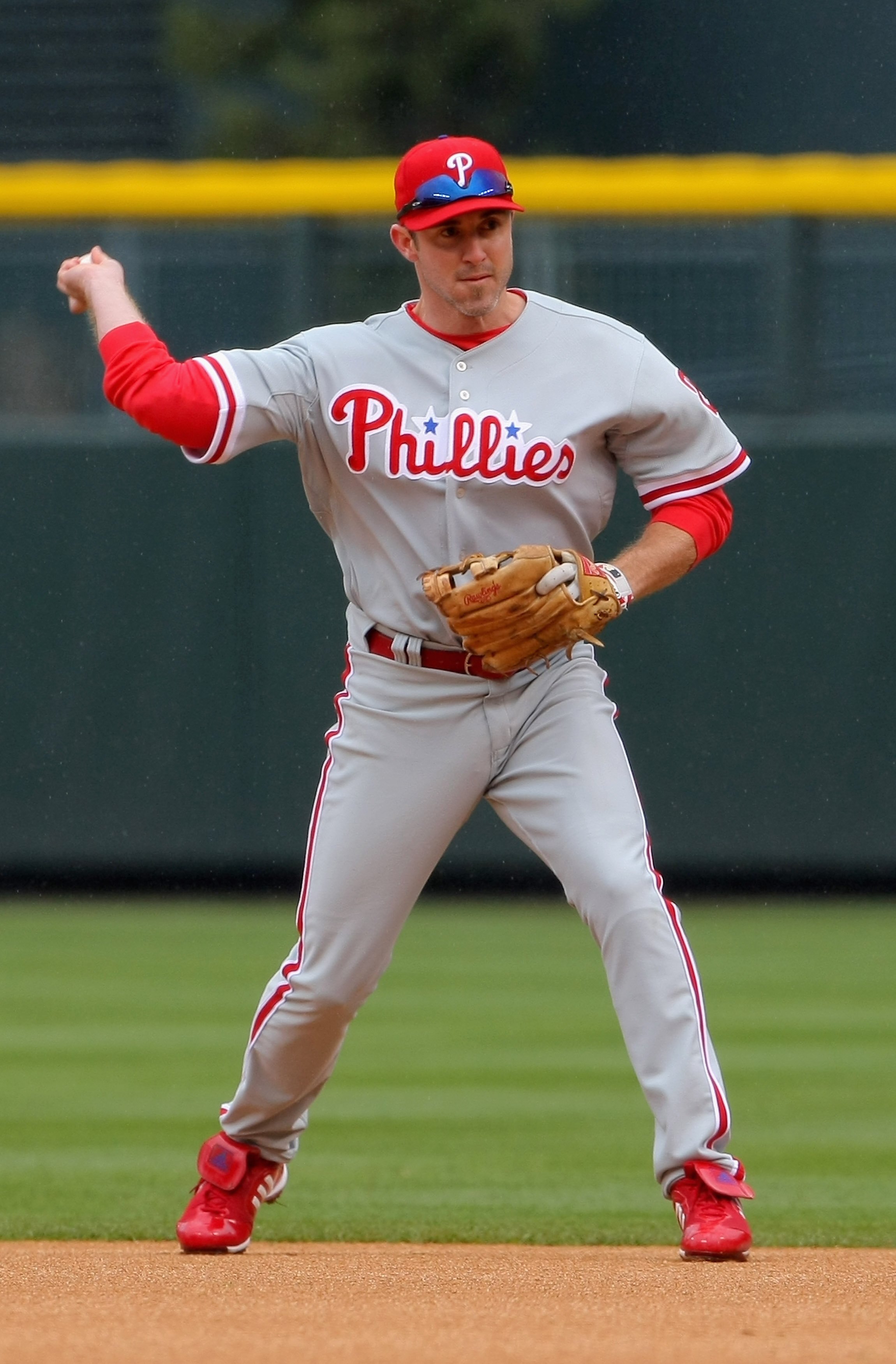 DENVER - APRIL 12:  Second baseman Chase Utley #26 of the Philadelphia Phillies plays defense against the Colorado Rockies at Coors Field on April 12, 2009 in Denver, Colorado. The Phillies defeated the Rockies 7-5.  (Photo by Doug Pensinger/Getty Images)