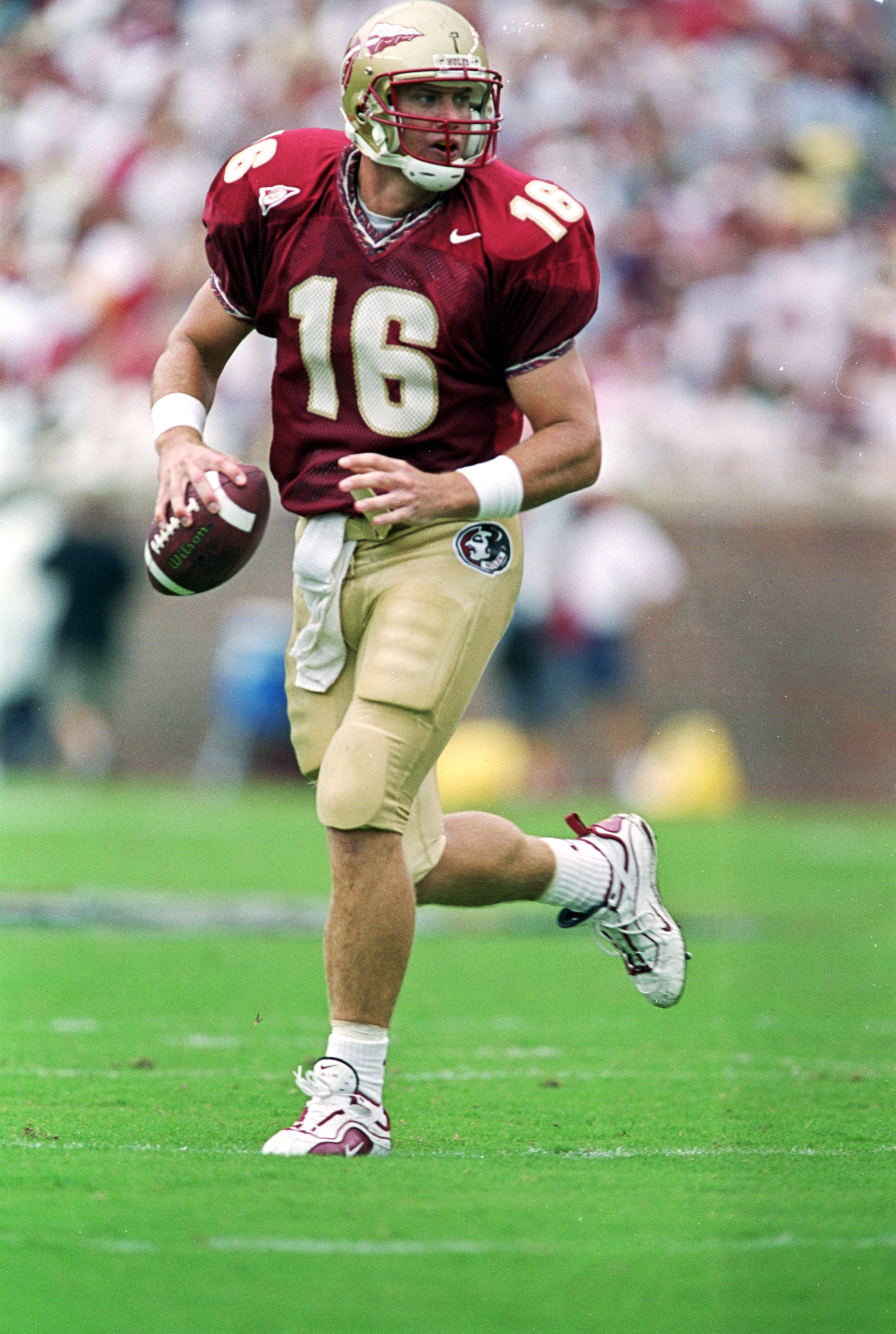 9 Oct 1999:  Chris Weinke #16 of the Florida State Seminoles moves with the ball during the game against the Miami Hurricanes at the Doak Campbell Stadium in Tallahassee, Florida. The Seminoles defeated the Hurricanes 31-21. Mandatory Credit: Andy Lyons  