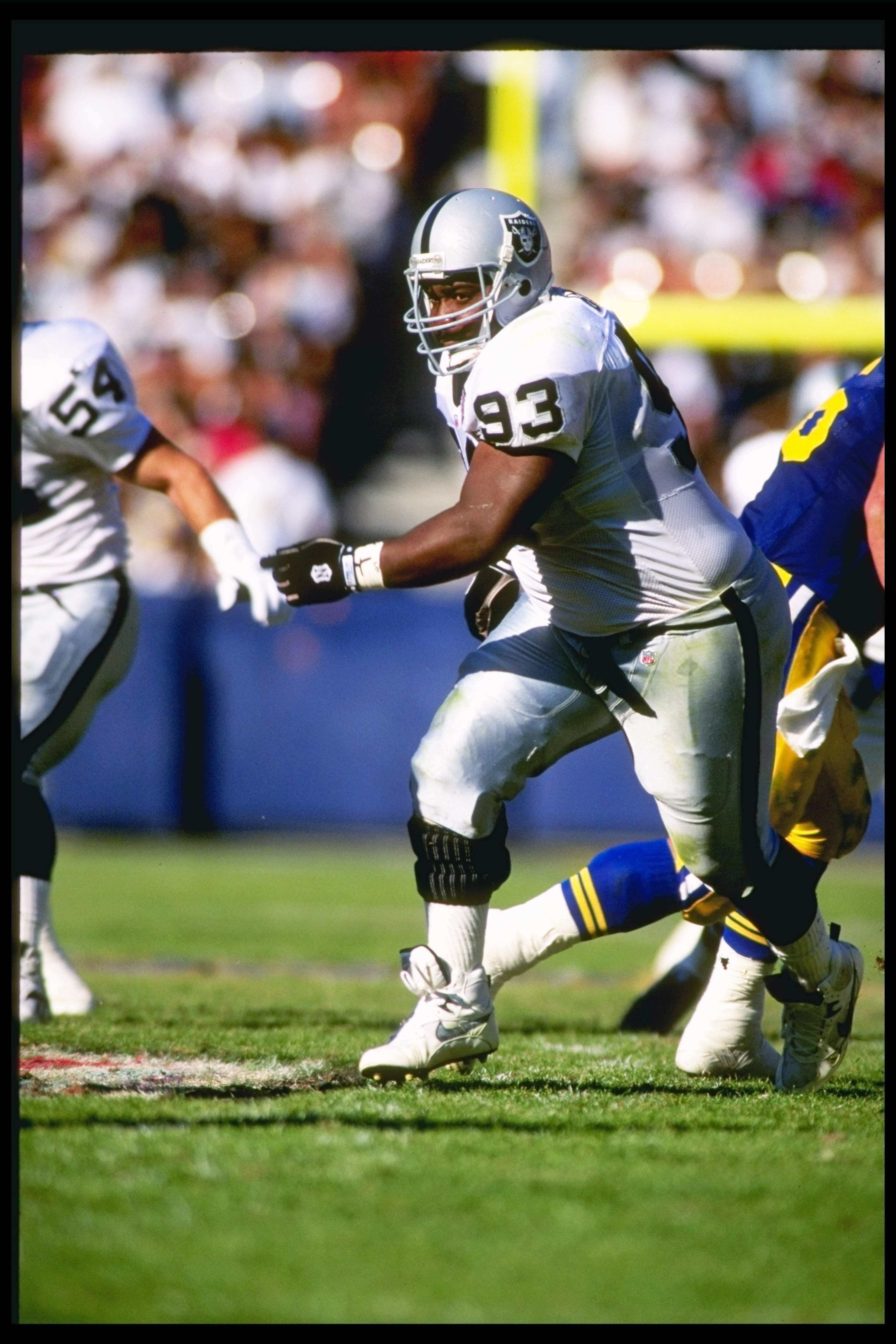 13 Nov 1994: Defensive lineman Jerry Ball of the Los Angeles Raiders moves down the field during a game against the Los Angeles Rams at the Anaheim Stadium in Anaheim, California. The Raiders won the game, 20-17. Mandatory Credit: Stephen Dunn /Allspor 13 Nov 1994: Defensive lineman Jerry Ball of the Los Angeles Raiders moves down the field during a game against the Los Angeles Rams at the Anaheim Stadium in Anaheim, California. The Raiders won the game, 20-17. Mandatory Credit: Stephen Dunn /Allspor