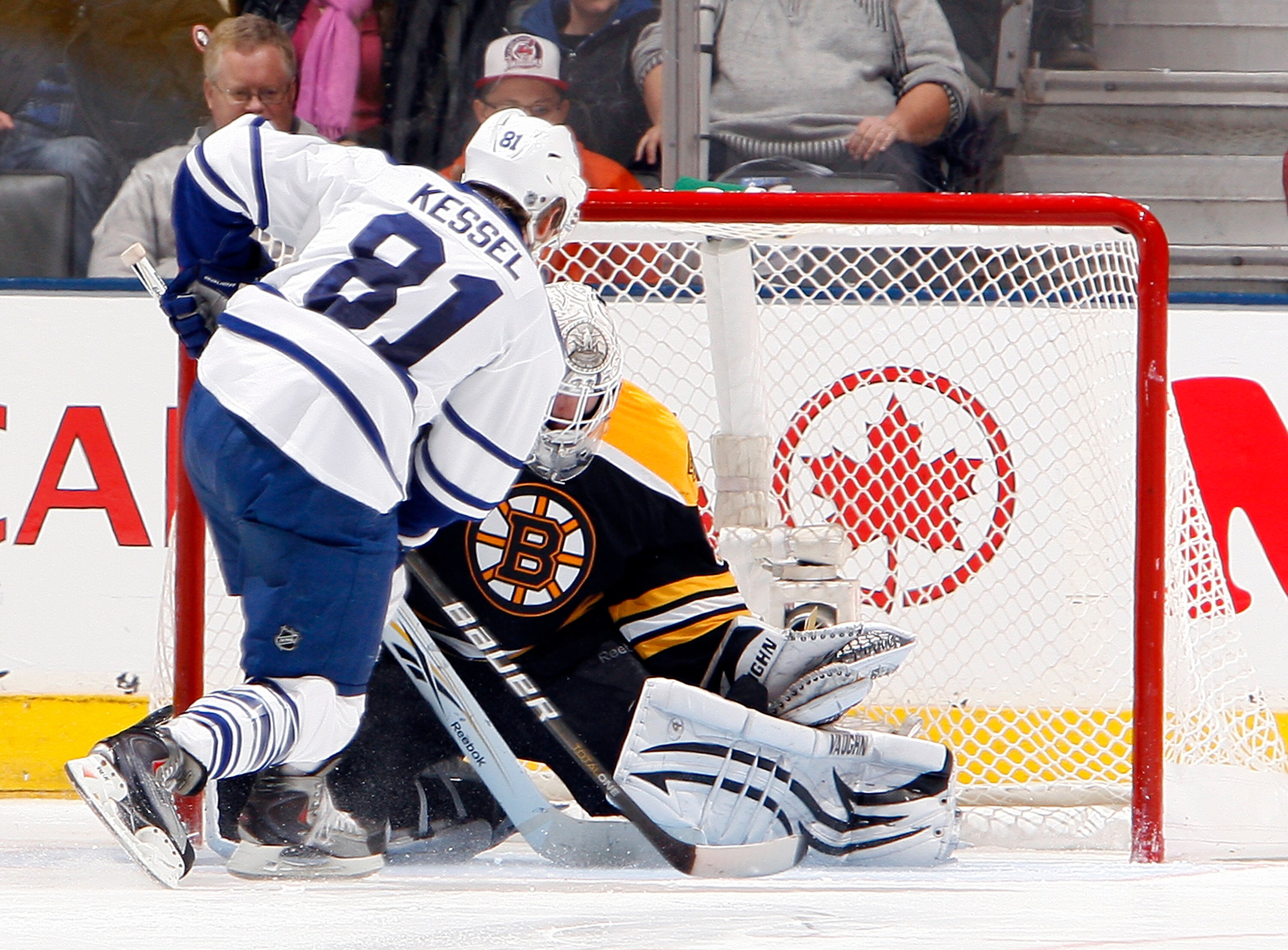 TORONTO, CANADA - DECEMBER 4: Phil Kessel #81 of the Toronto Maple Leafs scores shoot-out winnn goal against Tim Thomas #30 of the Boston Bruins during game action at the Air Canada Centre December 4, 2010 in Toronto, Ontario, Canada. (Photo by Abelimages