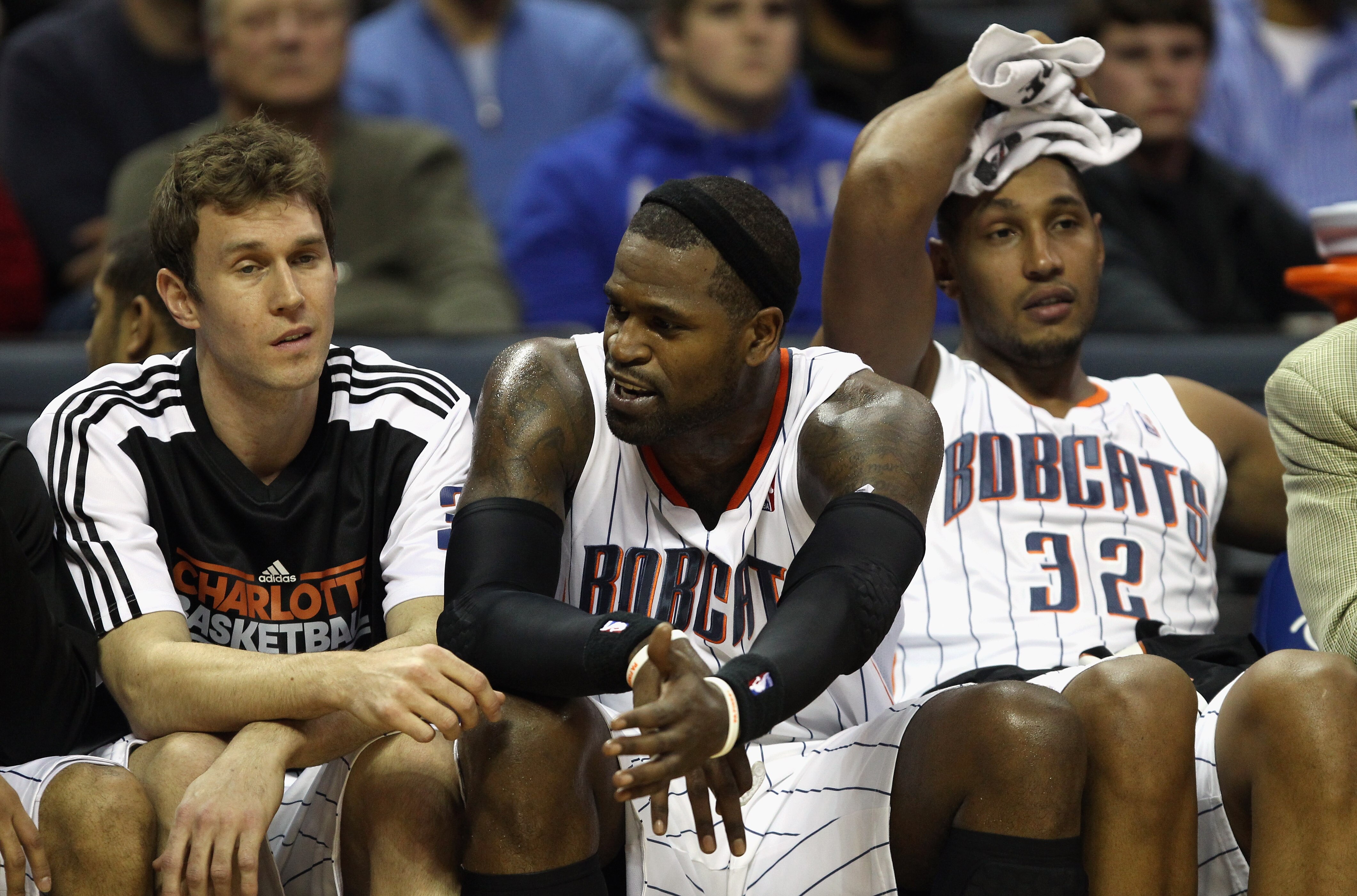 CHARLOTTE, NC - DECEMBER 21:  Teammates Matt Carroll #33, Stephen Jackson #1 and Boris Diaw #32 of the Charlotte Bobcats sit on the bench during their 99-81 loss to the Oklahoma City Thunder at Time Warner Cable Arena on December 21, 2010 in Charlotte, No