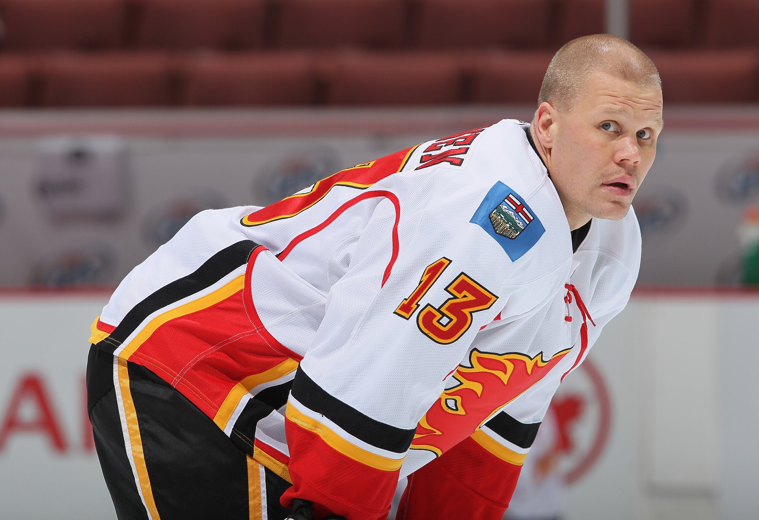 ANAHEIM, CA - DECEMBER 10:  Olli Jokinen #11 of the Calgary Flames looks on prior to the start of the game against the Anaheim Ducks at the Honda Center on December 10, 2010 in Anaheim, California.  (Photo by Jeff Gross/Getty Images)