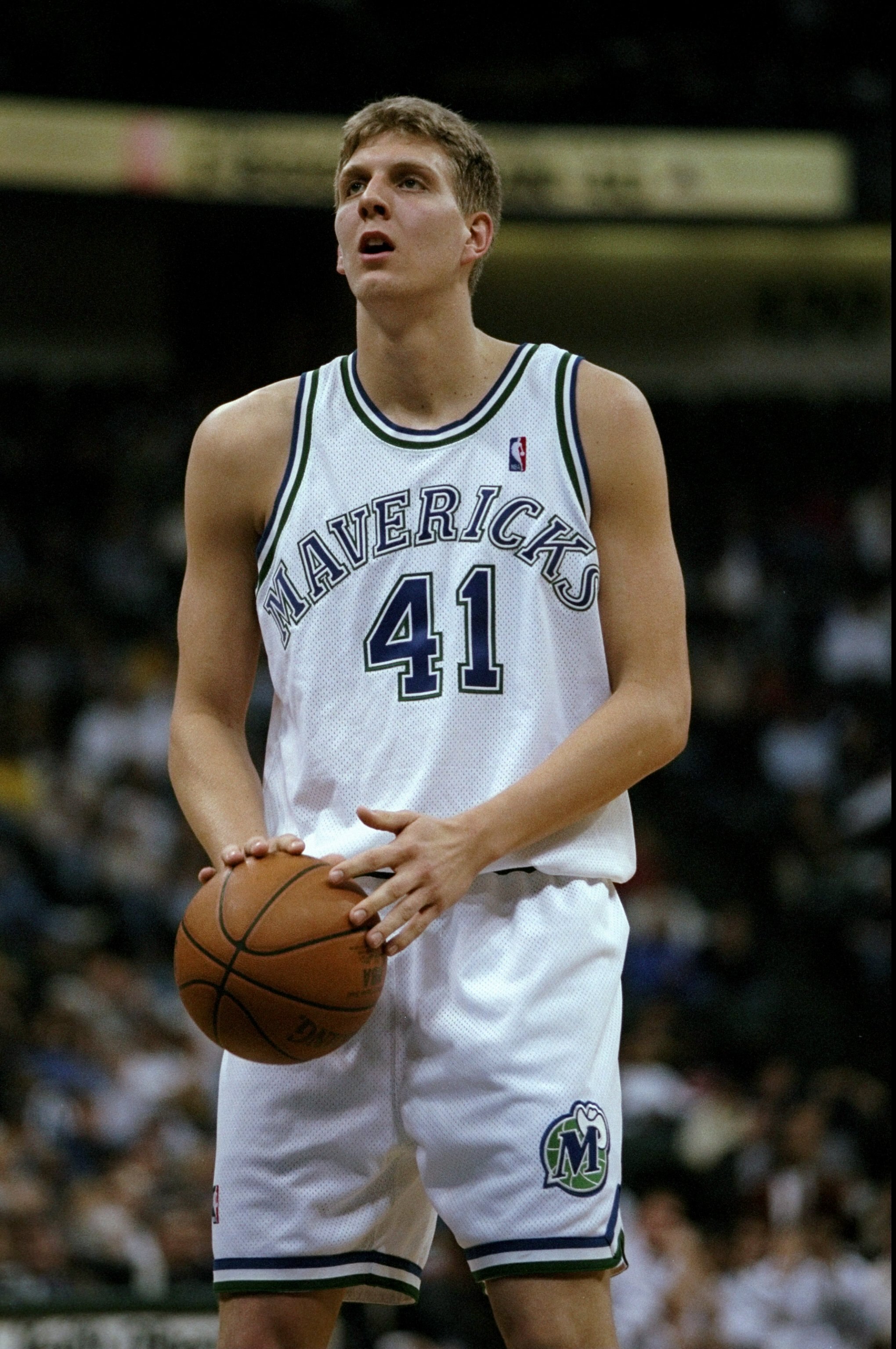 4 Mar 1999:  Dirk Nowitzki #41 of the Dallas Mavericks shooting a free throw during the game against the San Antonio Spurs at the Reunion Arena in Dallas, Texas. The Spurs defeated the Mavericks 95-79.   Mandatory Credit: Stephen Dunn  /Allsport