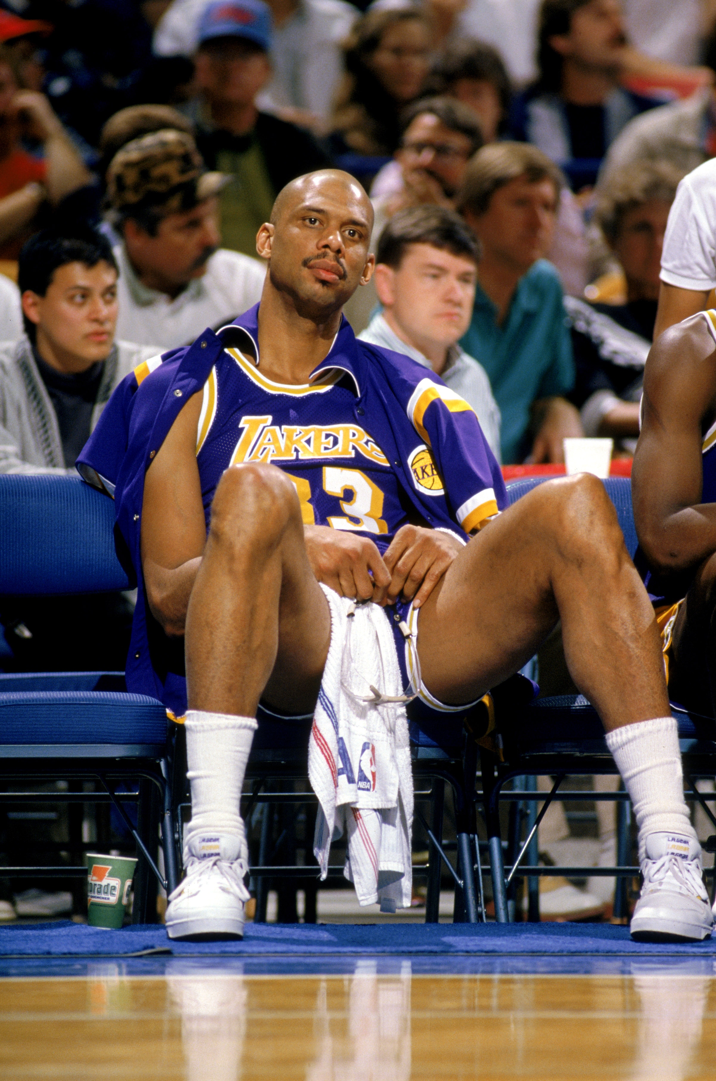 SACRAMENTO, CA - 1988:  Kareem Abdul-Jabbar #33 of the Los Angeles Lakers sits on the bench during an NBA game against the Sacramento Kings at Arco Arena in Sacramento, California in 1988. (Photo by Otto Greule Jr/Getty Images)
