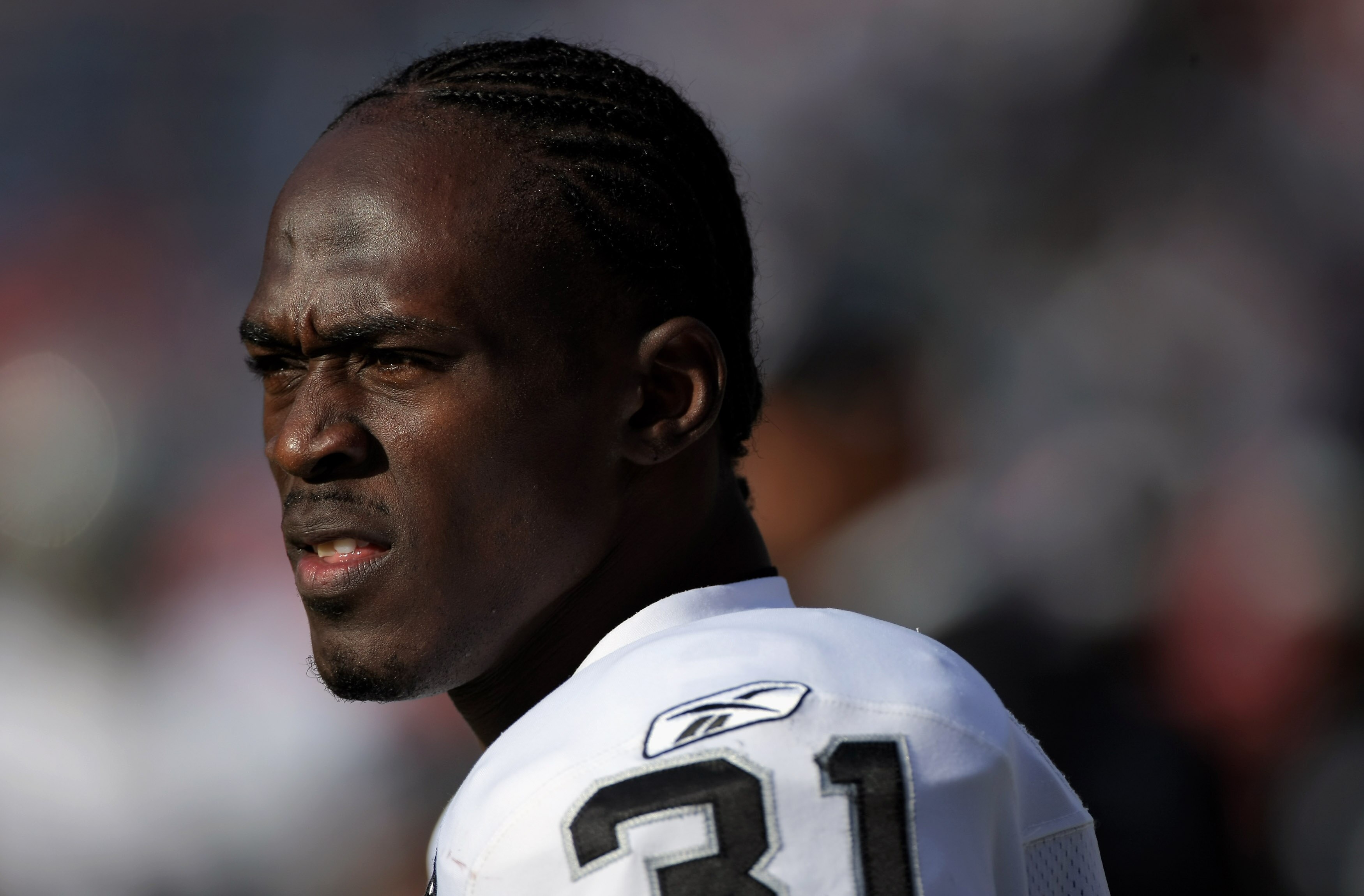 DENVER - NOVEMBER 23:  Safety Hiram Eugene #31 of the Oakland Raiders looks on during warm ups prior to facing the Denver Broncos during week 12 NFL action at Invesco Field at Mile High on November 23, 2008 in Denver, Colorado.  (Photo by Doug Pensinger/G