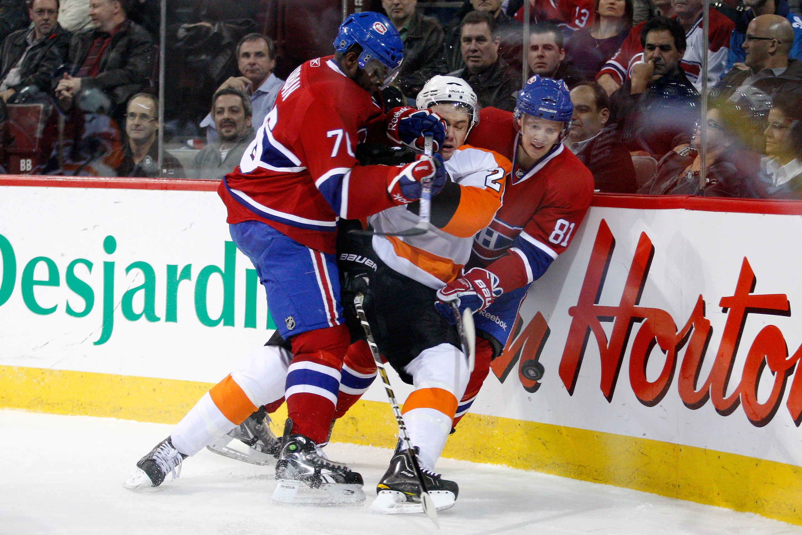 MONTREAL- NOVEMBER 16:  P.K. Subban #76 of the Montreal Canadiens body checks James van Riemsdyk #21 of the Philadelphia Flyers during the NHL game at the Bell Centre on November 16, 2010 in Montreal, Quebec, Canada.  (Photo by Richard Wolowicz/Getty Imag