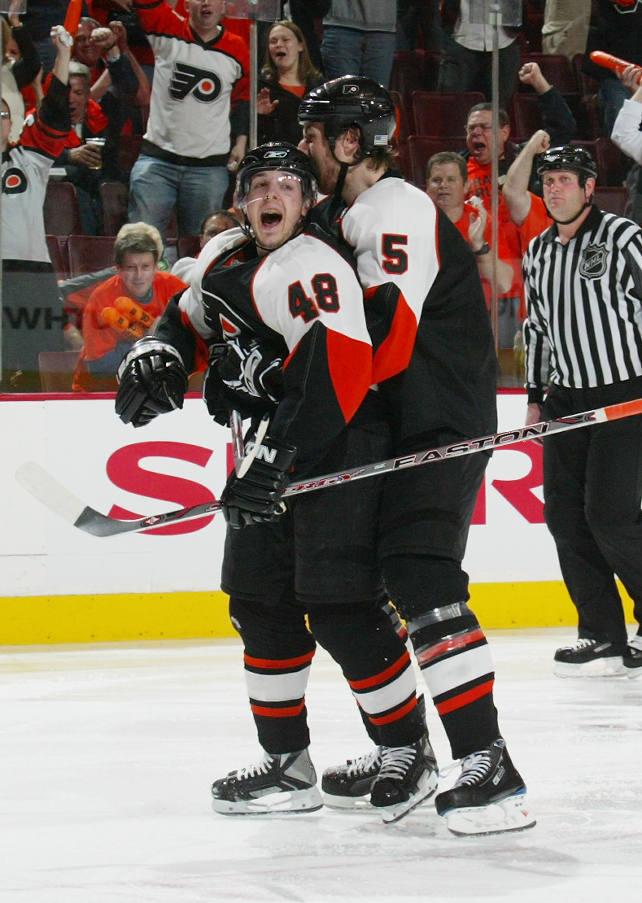 PHILADELPHIA - APRIL 21:  Braydon Coburn #5 embraces Daniel Briere #48 of the Philadelphia Flyers, who scored on a powerplay at 1:18 of the second period against the Washington Capitals in game six of the Eastern Conference Quarterfinals of the 2008 NHL S