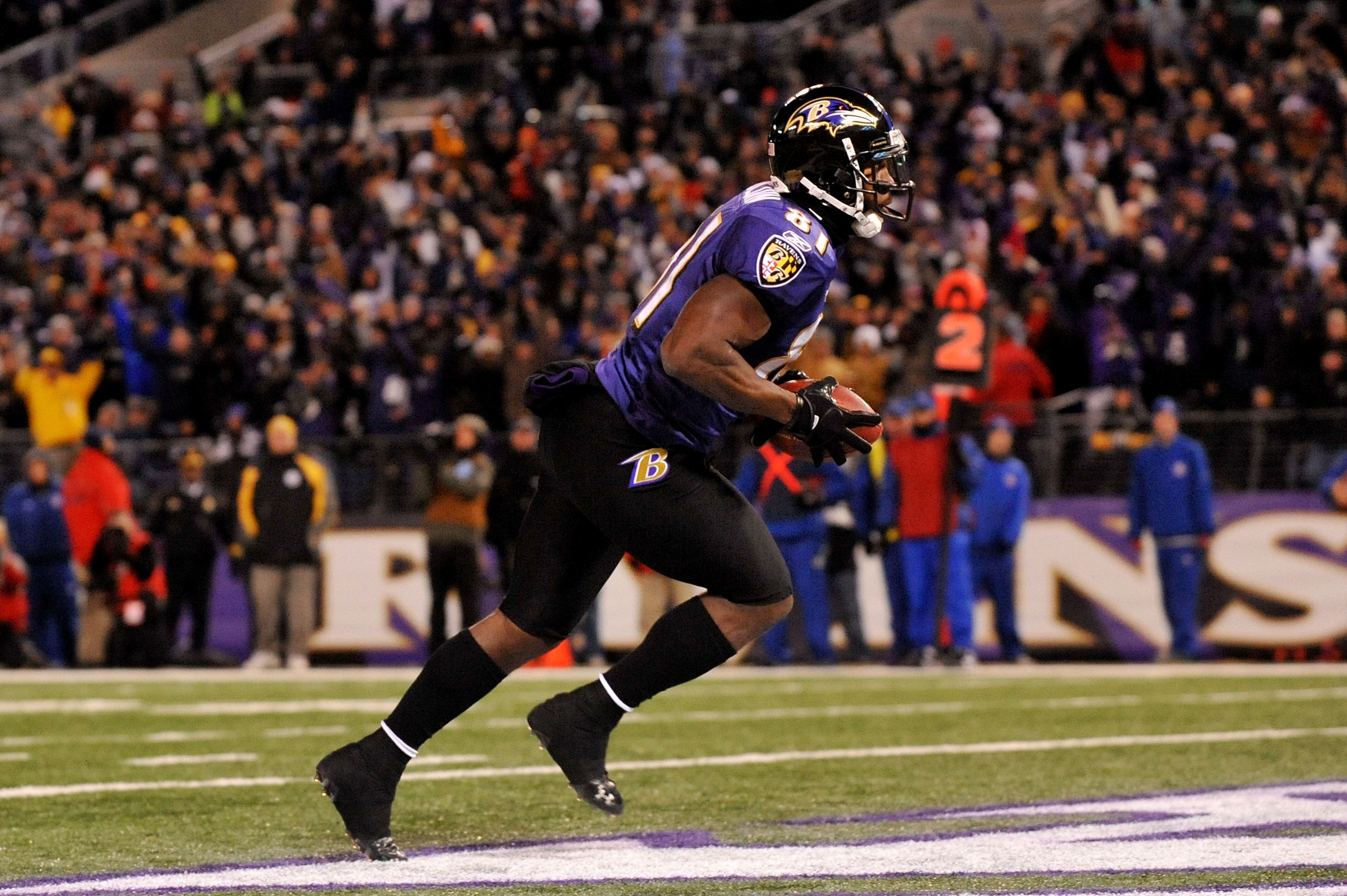 BALTIMORE, MD - DECEMBER 05:  Wide receiver Anquan Boldin #81 of the Baltimore Ravens scores a touchdown against the Pittsburgh Steelers during the first quarter of the game at M&T Bank Stadium on December 5, 2010 in Baltimore, Maryland.  (Photo by Larry