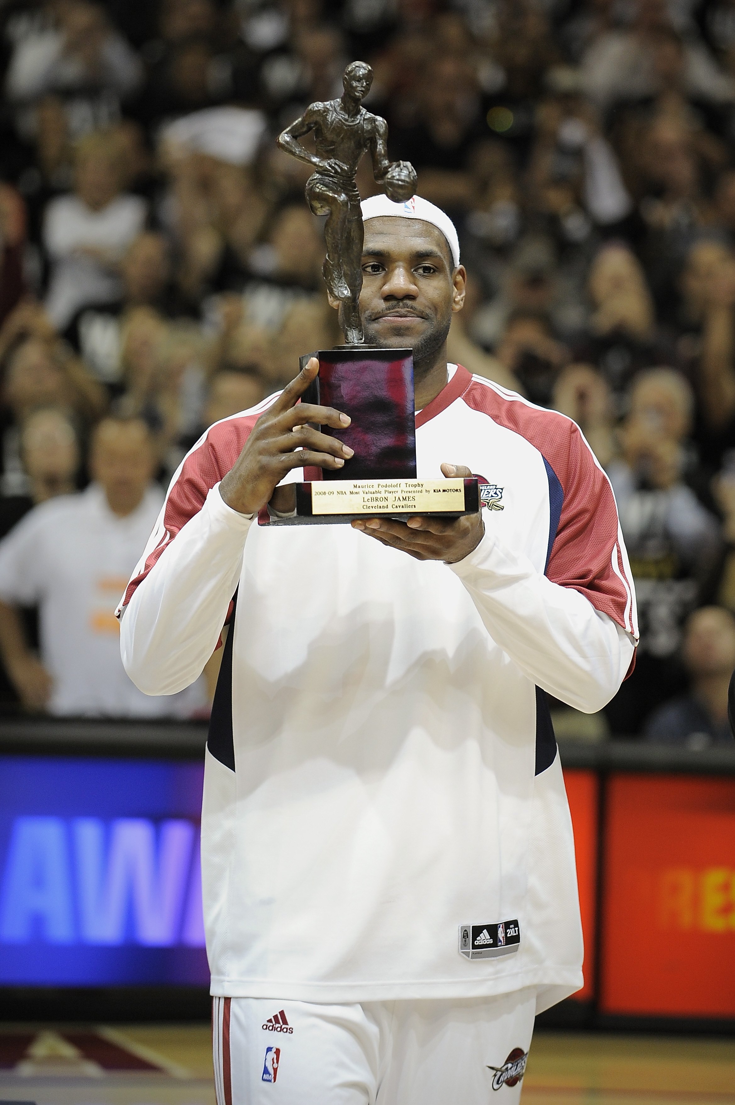 CLEVELAND - MAY 5:  LeBron James #23 of the Cleveland Cavaliers receives the 2008-2009 MVP Trophy prior to the start of Game One of the Eastern Conference Semifinals against the Atlanta Hawks during the 2009 NBA Playoffs at Quicken Loans Arena on May 5, 2