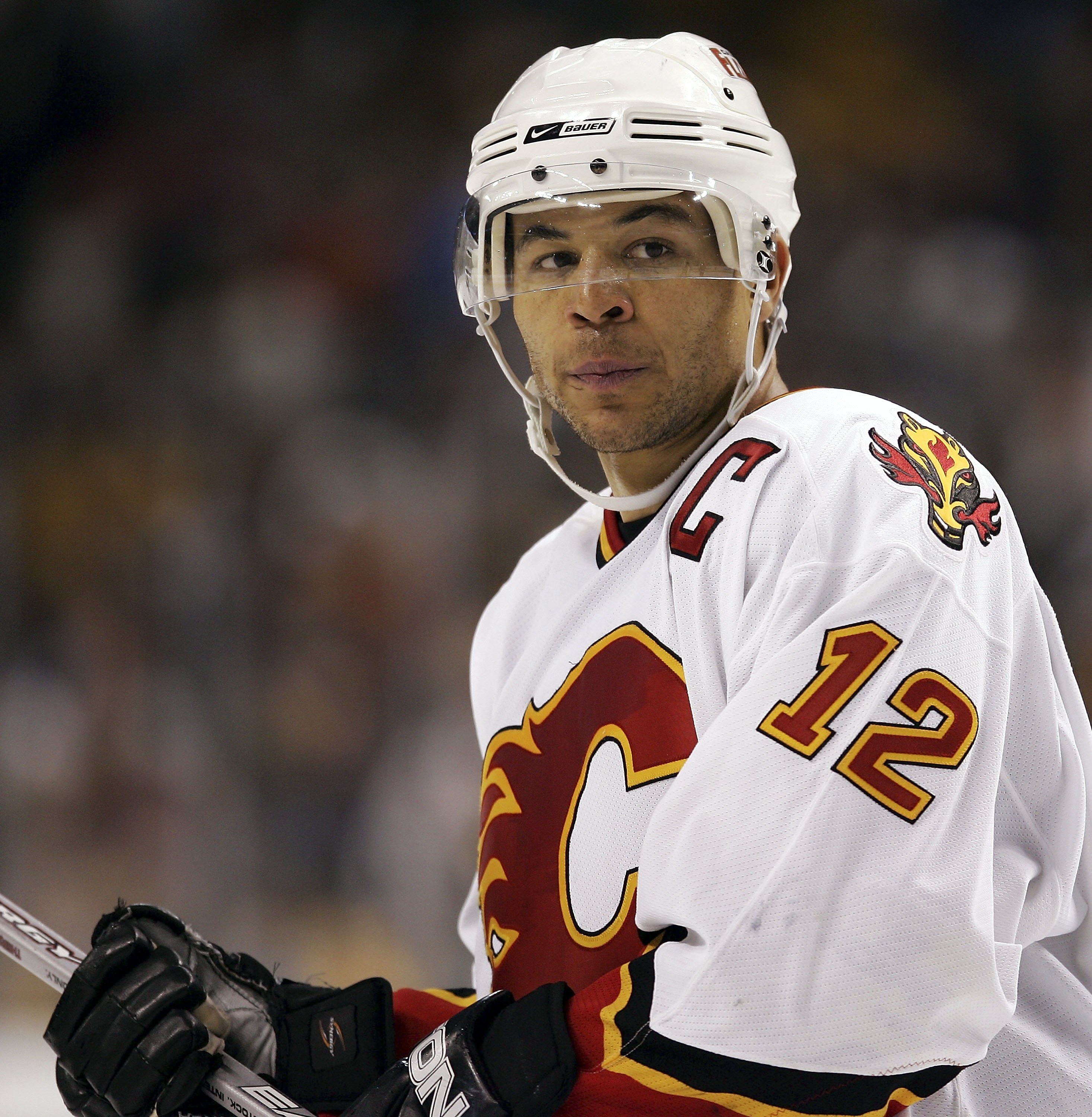 BOSTON - OCTOBER 19:  Jarome Iginla #12 of the Calgary Flames skates off the ice after losing to the Boston Bruins on October 19, 2006 at TD Banknorth Garden in Boston, Massachusetts. The Boston Bruins defeated the Calgary Flames 3-2 to win their home ope