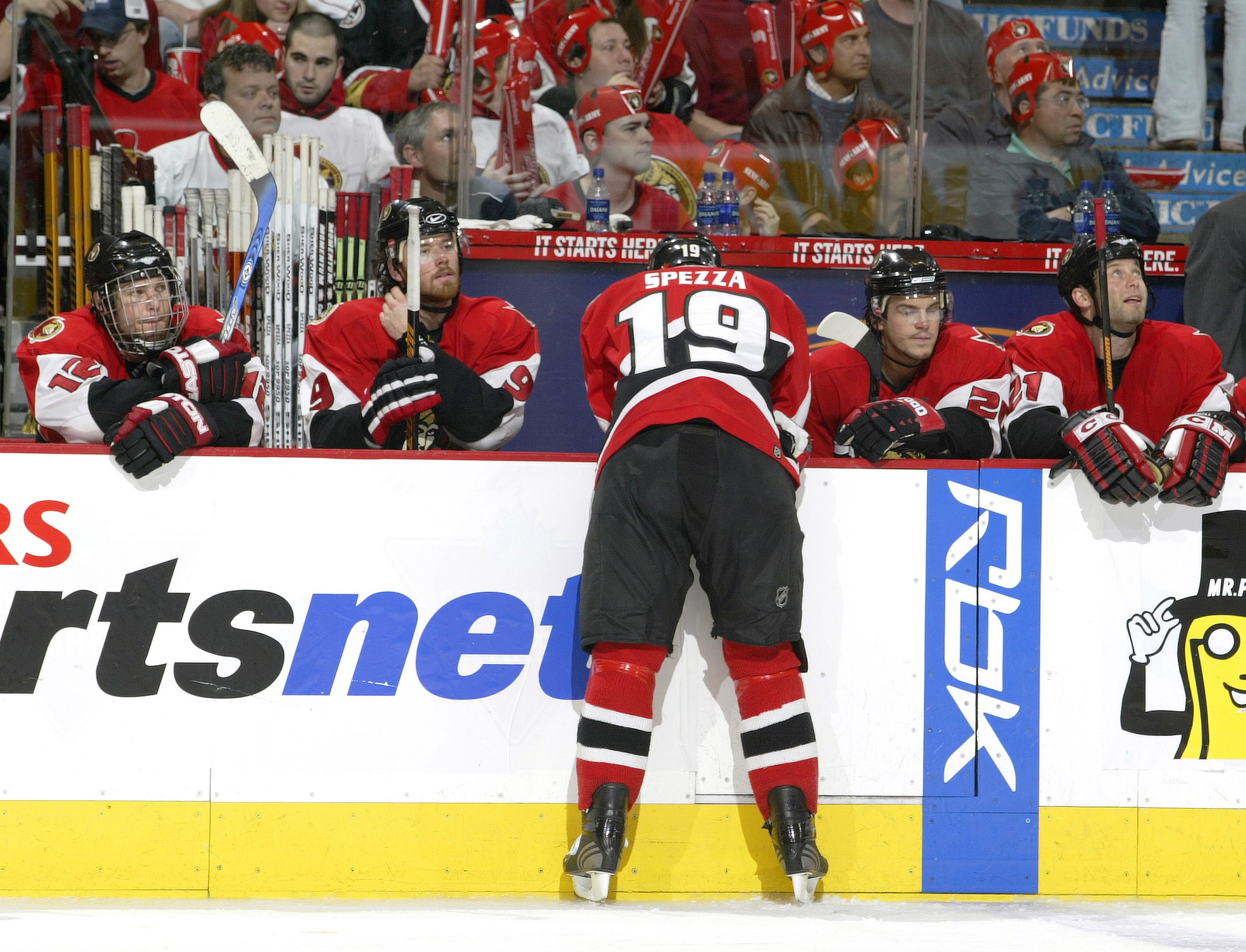 OTTAWA - MAY 13:  Jason Spezza #19 of the Ottawa Senators leans over the bench as his teammates sit dejected after losing game five of the Eastern Conference Semifinals against the Buffalo Sabres during the 2006 NHL Playoffs on May 13, 2006 at Scotiabank