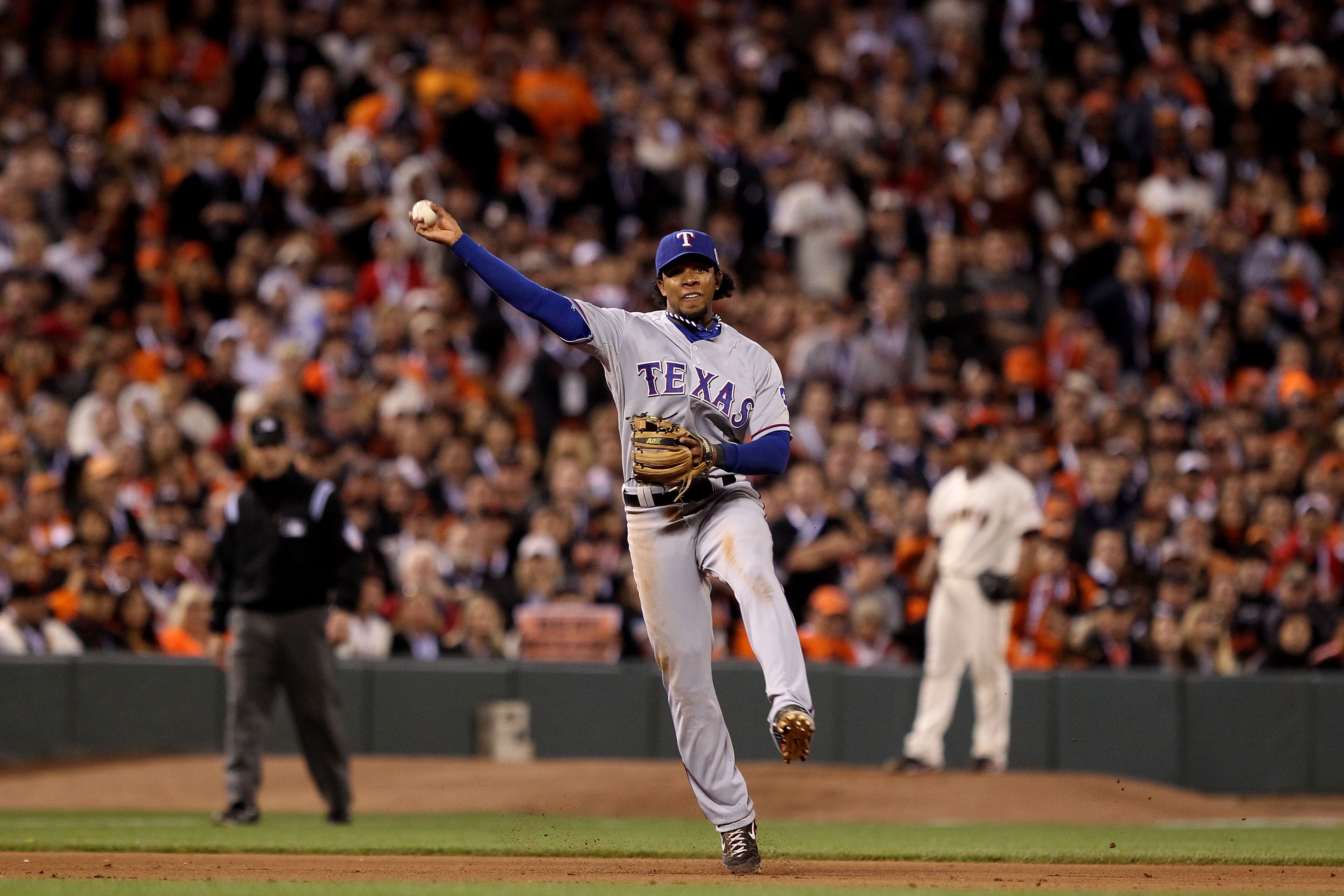 SAN FRANCISCO - OCTOBER 27:  Elvis Andrus #1 of the Texas Rangers throws to first base against the San Francisco Giants in Game One of the 2010 MLB World Series at AT&T Park on October 27, 2010 in San Francisco, California.  (Photo by Jed Jacobsohn/Getty