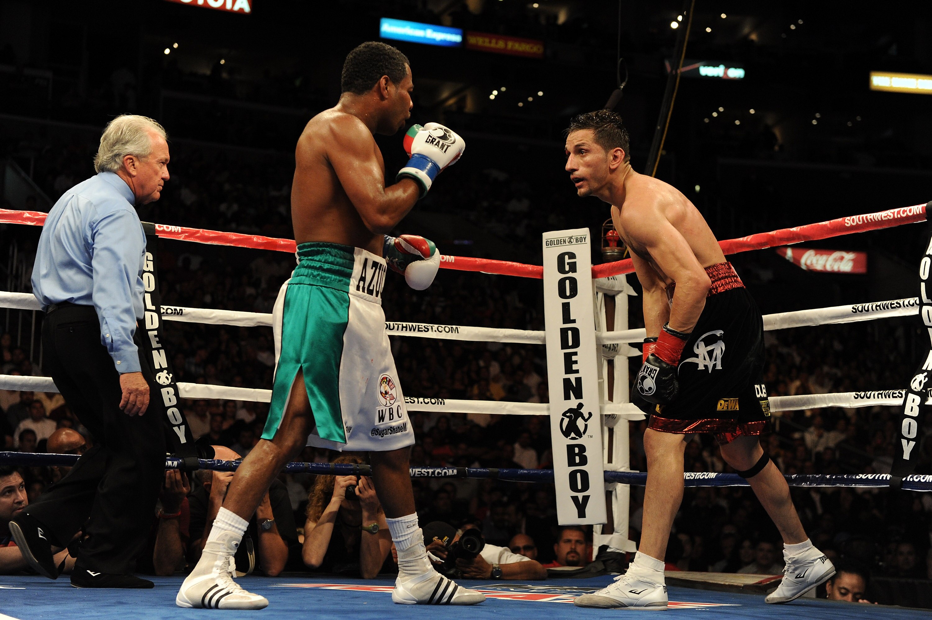 LOS ANGELES, CA - SEPTEMBER 18: (Left)  Shane Mosley and Sergio Mora fight to a draw during the sixth round of the Middleweight bout at Staples Center on September 18, 2010 in Los Angeles, California.  (Photo by Harry How/Getty Images)