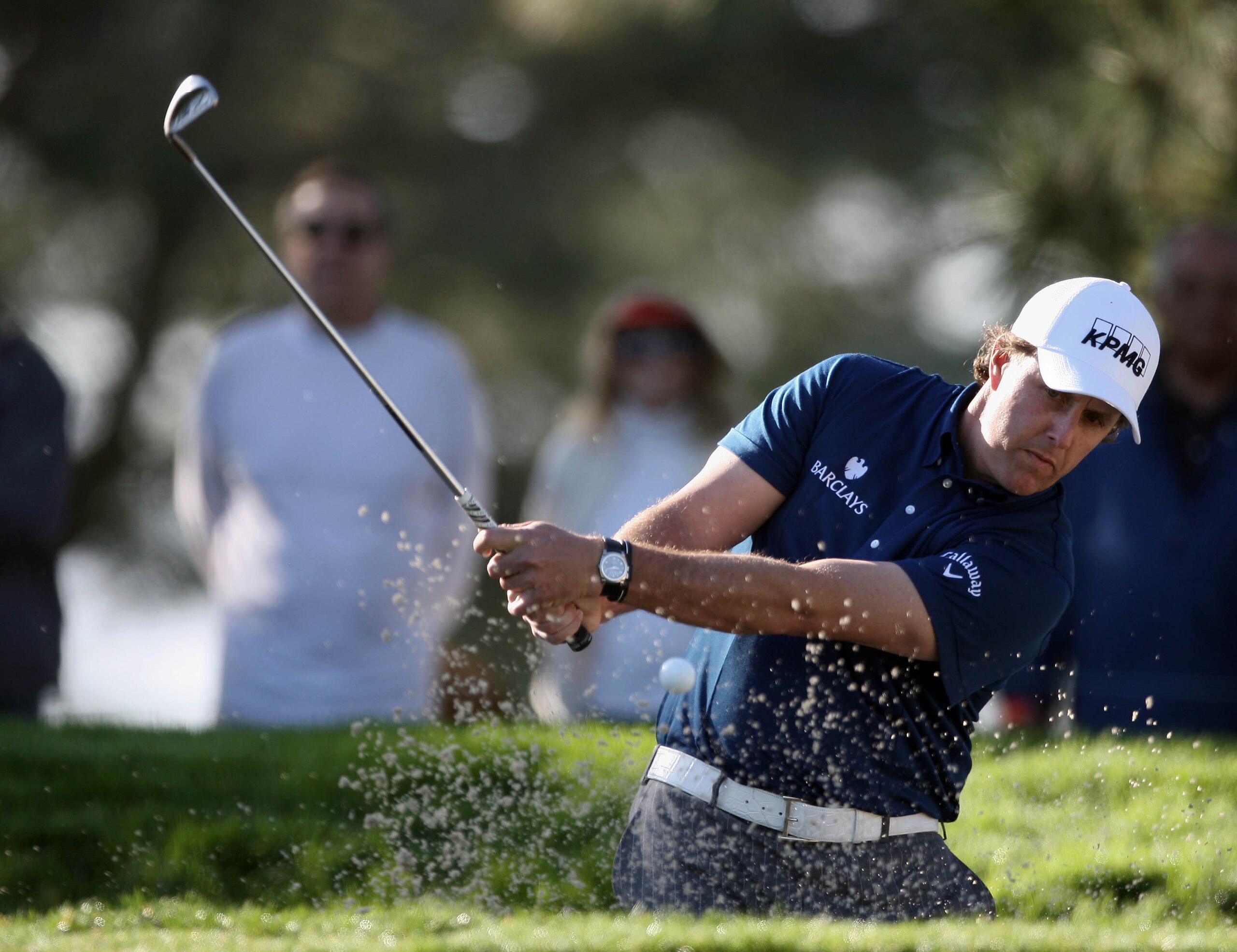 LA JOLLA, CA - JANUARY 28: Phil Mickelson hits out of the bunker on the 1st hole during the 2010 Farmers Insurance Open, Round 1 on January 28, 2010 at Torrey Pines in La Jolla, California. (Photo by Donald Miralle/Getty Images)