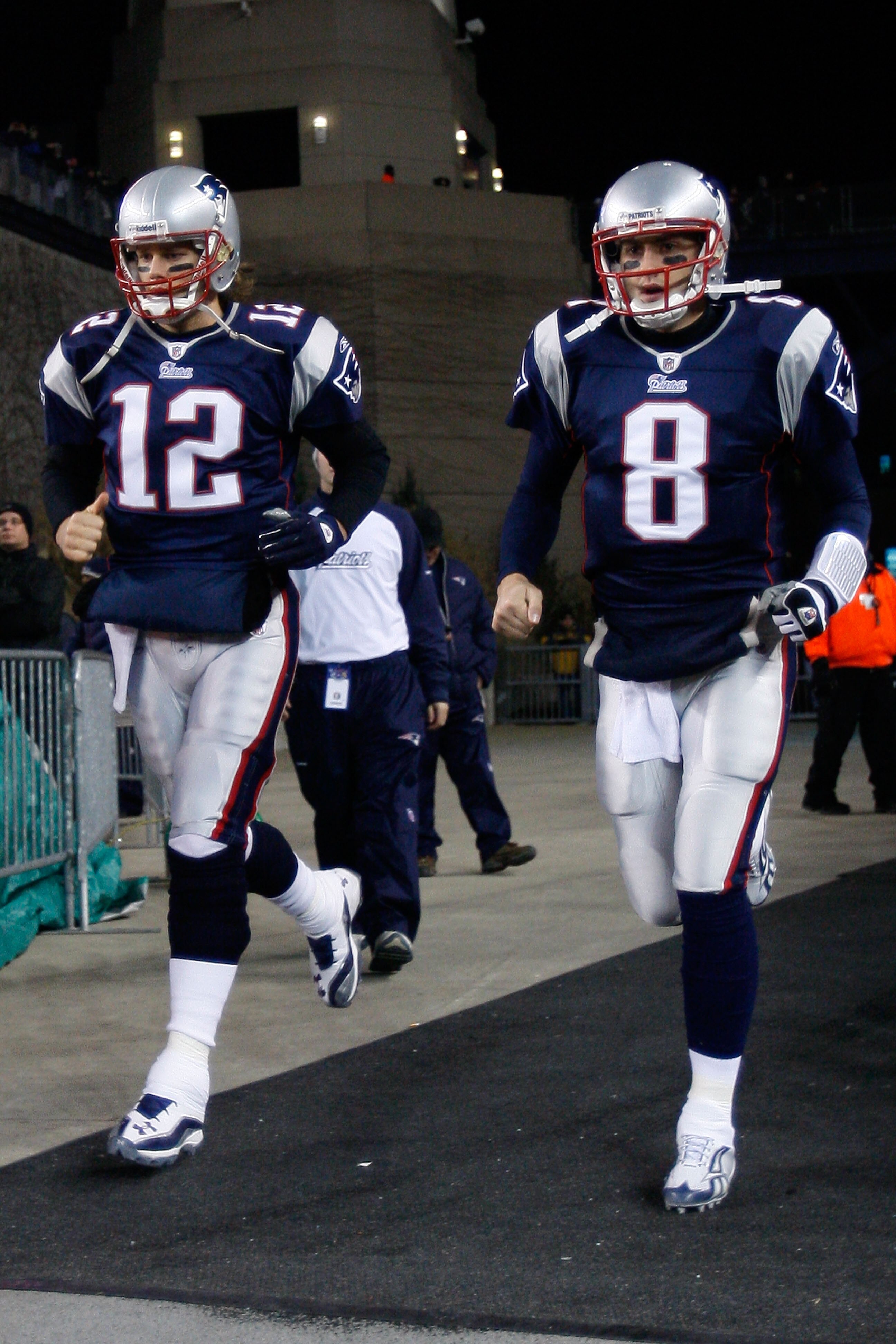 FOXBORO, MA - DECEMBER 19:  Quarterbacks Tom Brady #12 and Brian Hoyer #8 of the New England Patriots run out to the field during the game against the Green Bay Packers at Gillette Stadium on December 19, 2010 in Foxboro, Massachusetts. The Patriots won t