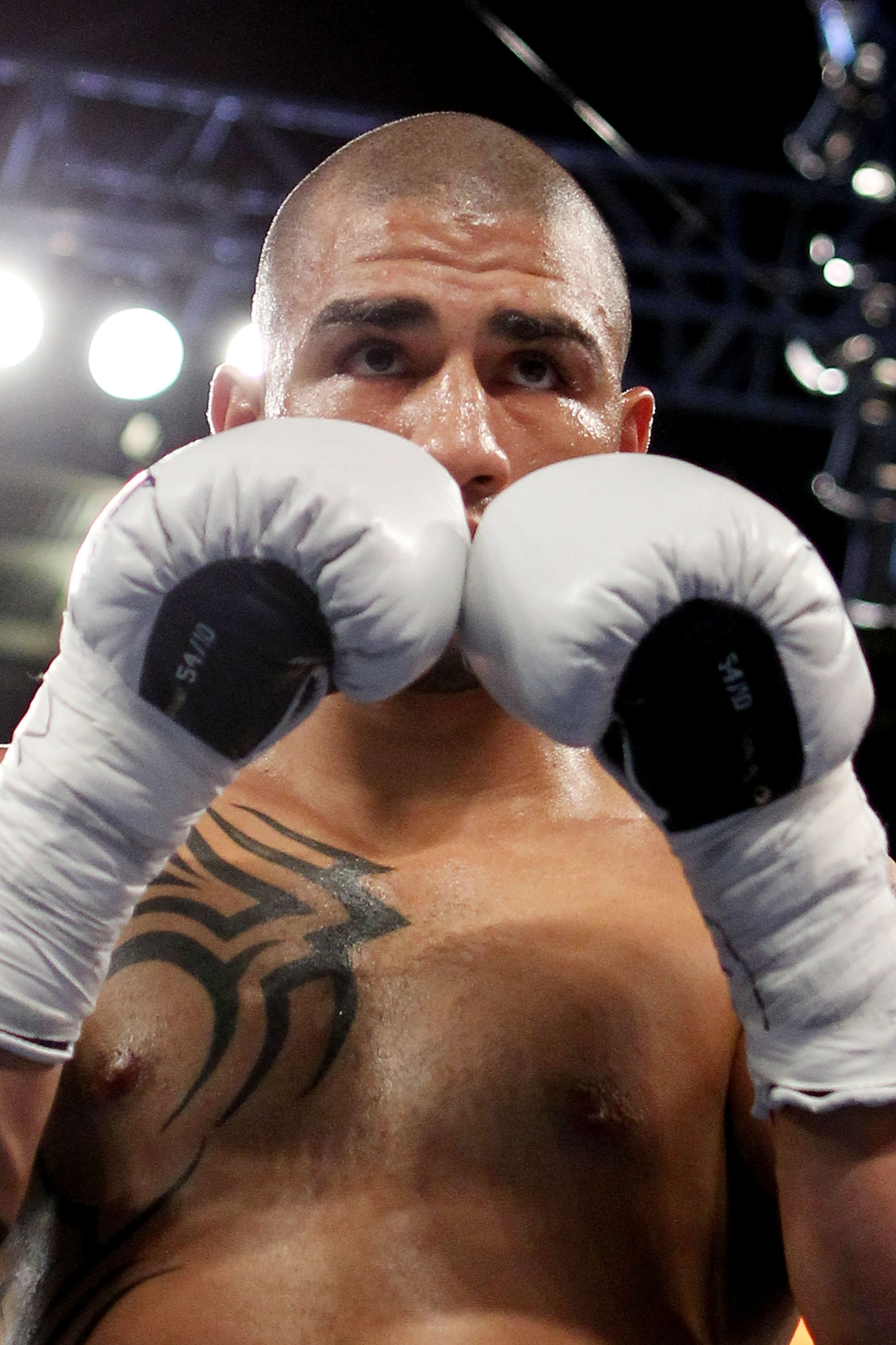 NEW YORK - JUNE 05: Miguel Cotto of Puerto Rico looks on during the WBA world super welterweight title fight against Yuri Foreman (not pictured) on June 5, 2010 at Yankee Stadium in the Bronx borough of New York City. Cotto wins by TKO in the ninth round NEW YORK - JUNE 05: Miguel Cotto of Puerto Rico looks on during the WBA world super welterweight title fight against Yuri Foreman (not pictured) on June 5, 2010 at Yankee Stadium in the Bronx borough of New York City. Cotto wins by TKO in the ninth round