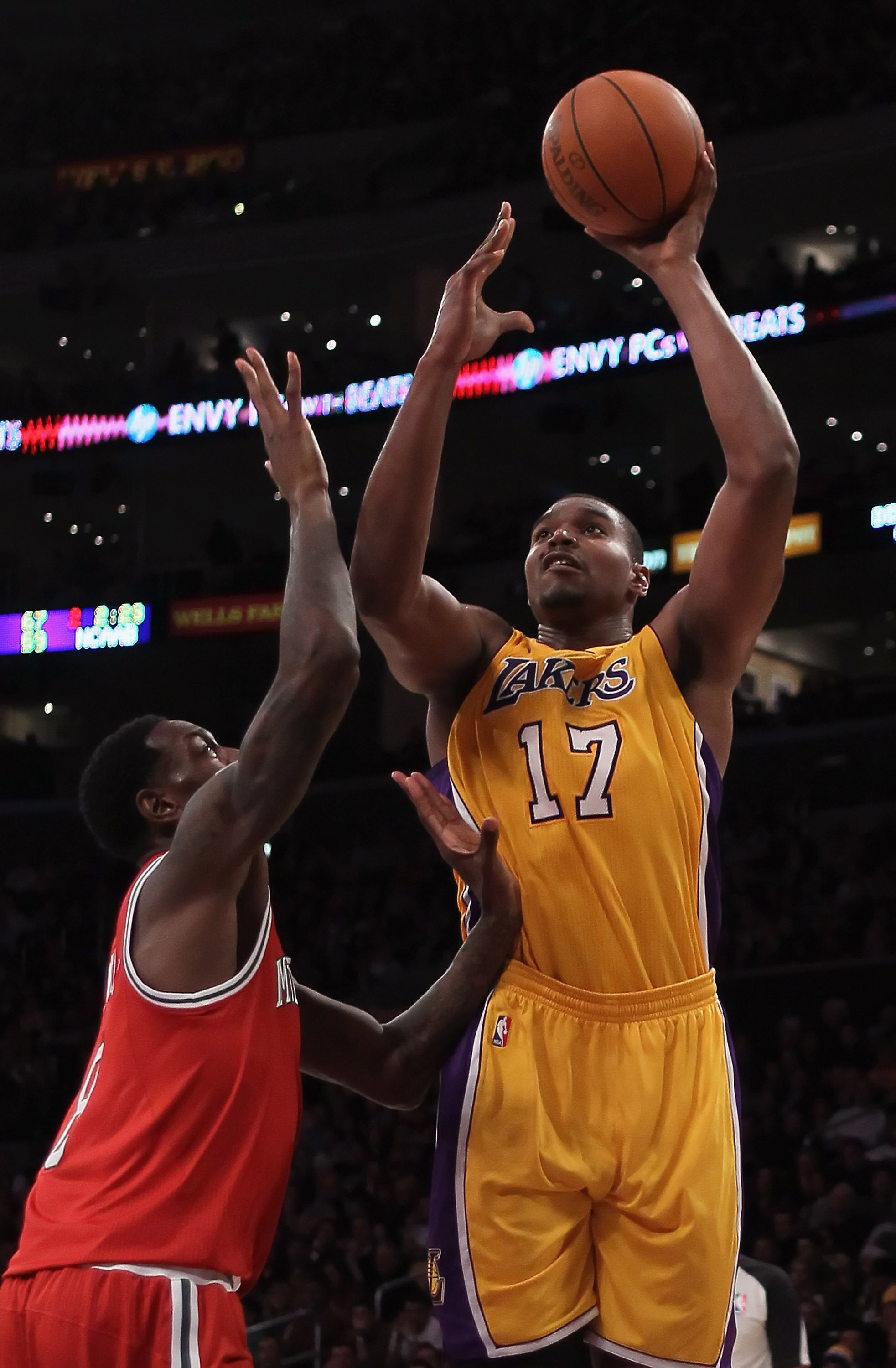 LOS ANGELES, CA - DECEMBER 21:  Andrew Bynum #17 of the Los Angeles Lakers shoots over Larry Sanders #8 of the Milwaukee Bucks during the first half at Staples Center on December 21, 2010 in Los Angeles, California. NOTE TO USER: User expressly acknowledg