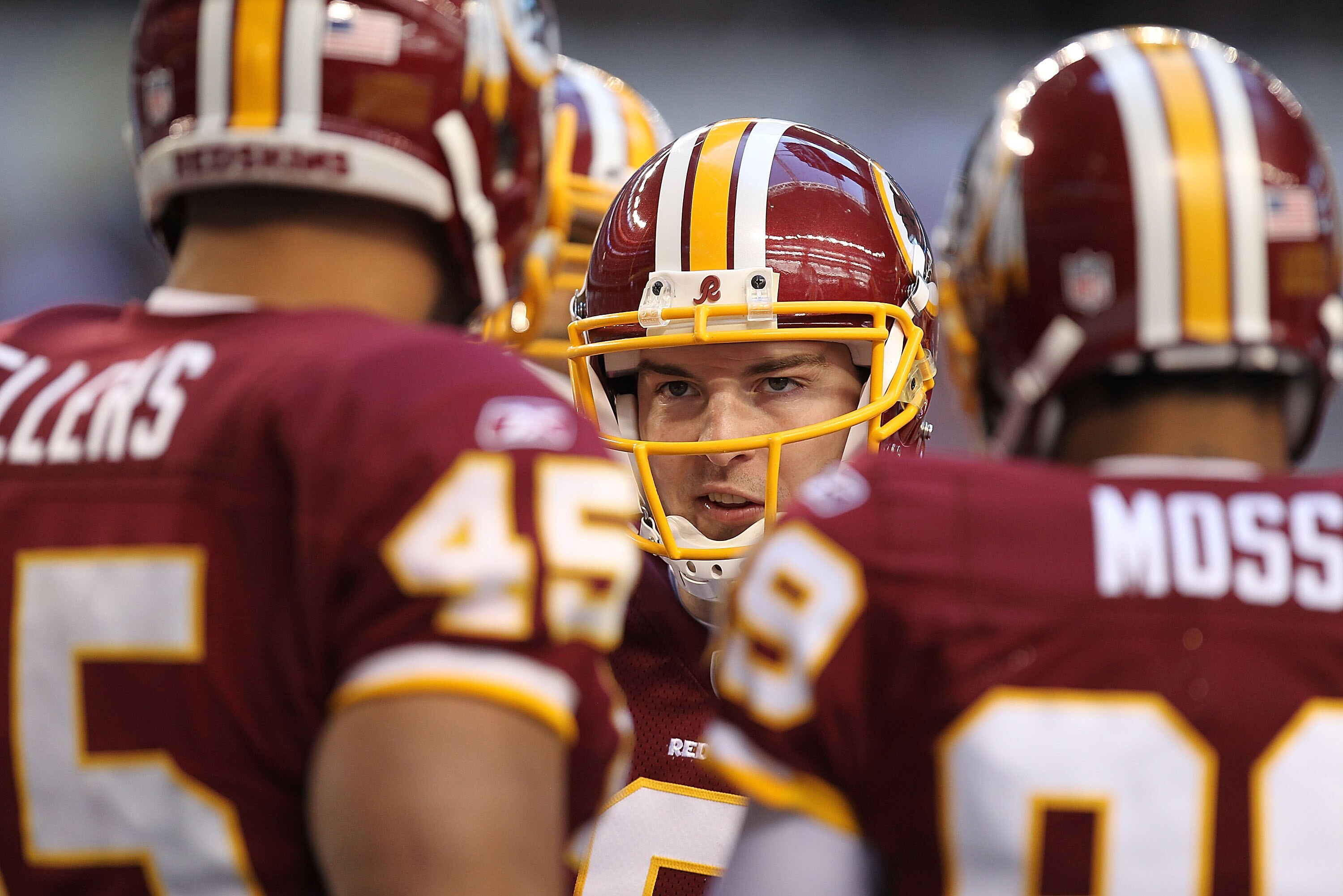 ARLINGTON, TX - DECEMBER 19:  Quarterback Rex Grossman #8 of the Washington Redskins during play against the Dallas Cowboys at Cowboys Stadium on December 19, 2010 in Arlington, Texas.  (Photo by Ronald Martinez/Getty Images)