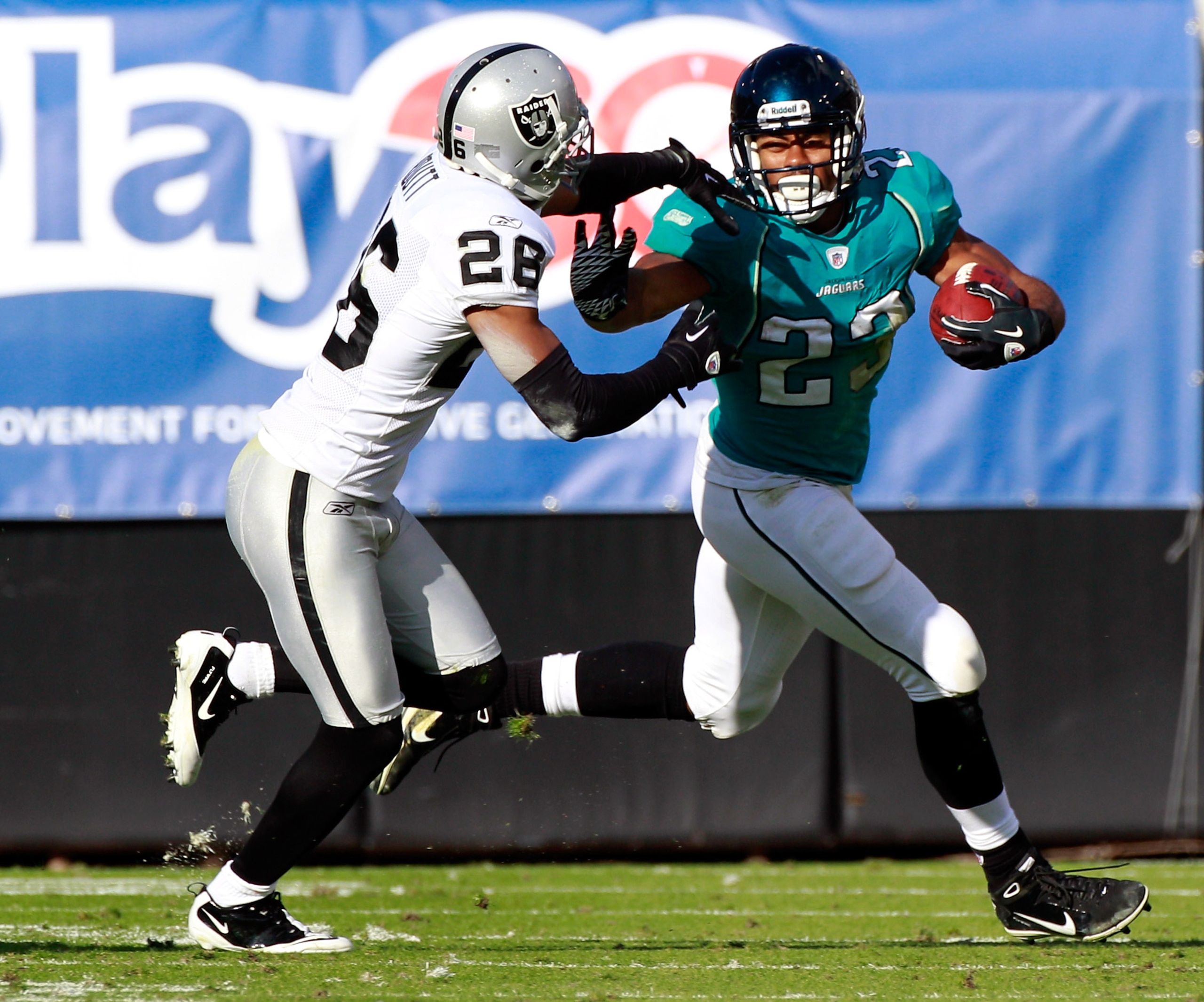 JACKSONVILLE, FL - DECEMBER 12: Rashad Jennings #23 of the Jacksonville Jaguars rushes against Stanford Routt #26 of the Oakland Raiders during the game at EverBank Field on December 12, 2010 in Jacksonville, Florida. (Photo by Sam Greenwood/Getty Image JACKSONVILLE, FL - DECEMBER 12: Rashad Jennings #23 of the Jacksonville Jaguars rushes against Stanford Routt #26 of the Oakland Raiders during the game at EverBank Field on December 12, 2010 in Jacksonville, Florida. (Photo by Sam Greenwood/Getty Image
