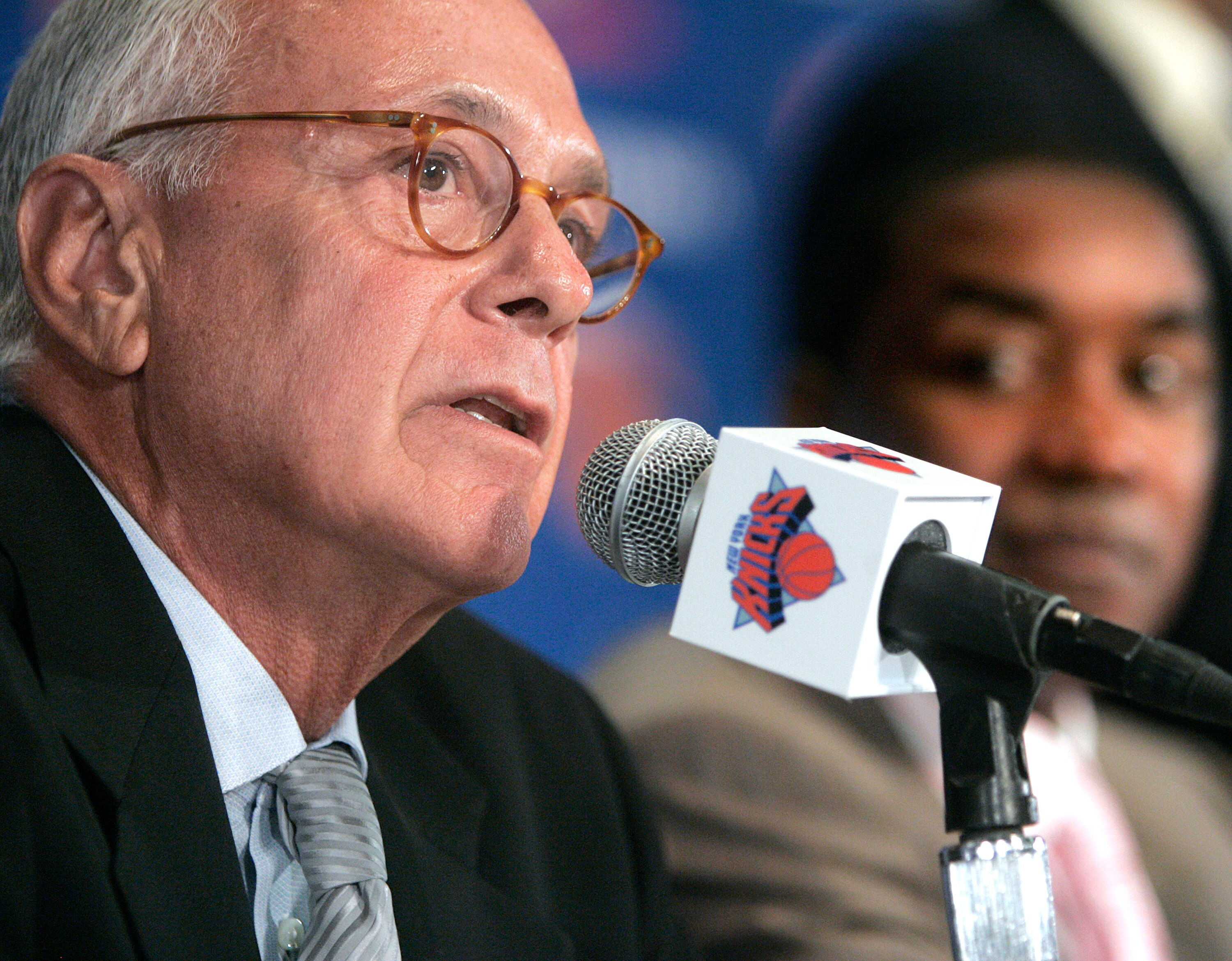 NEW YORK - JULY 28: Newly named New York Knicks coach Larry Brown (L) speaks as Knicks President Isiah Thomas looks on during a press conference at Madison Square Garden July 28, 2005 in New York City. Brown will be taking over from Herb Williams and is t