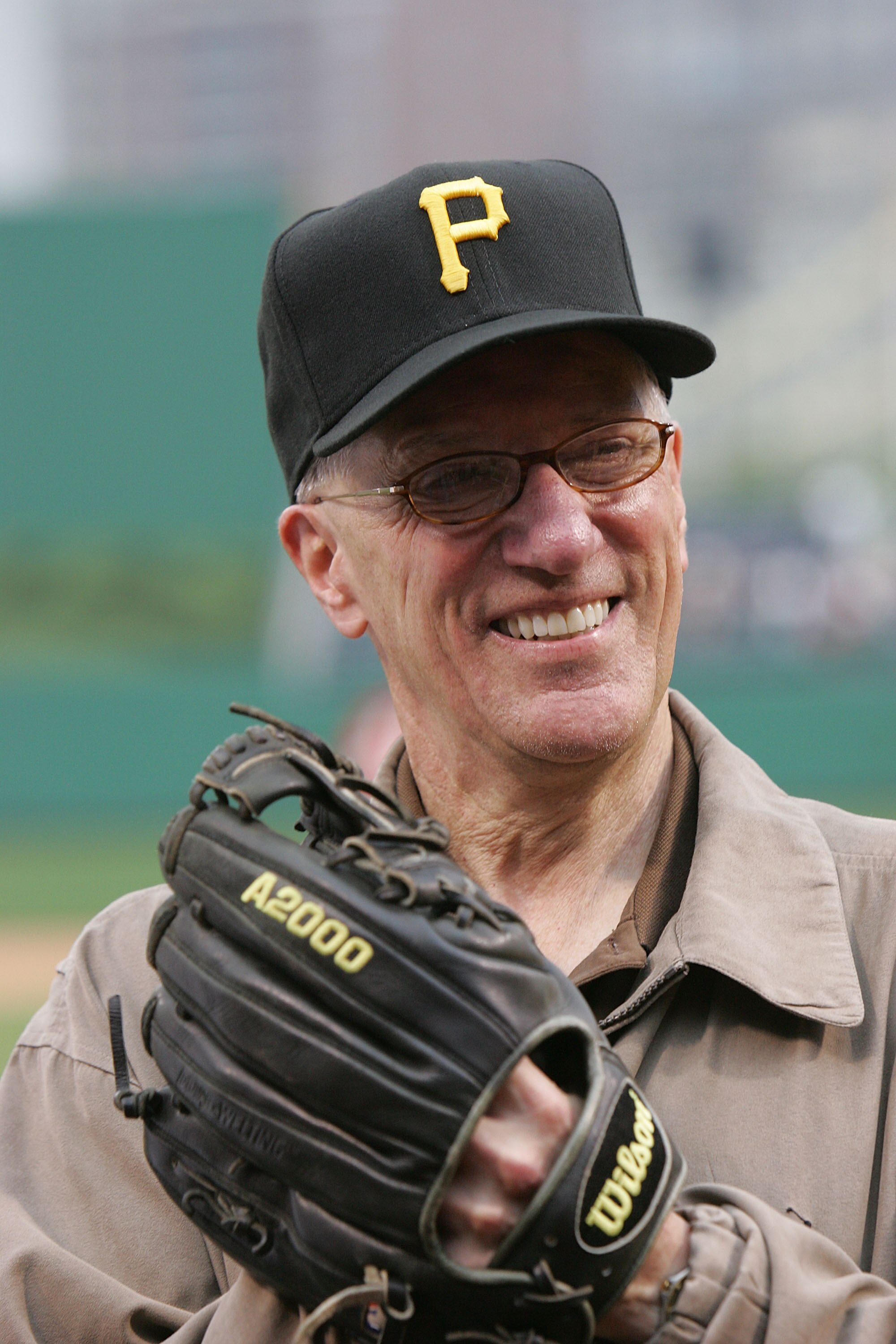 PITTSBURGH - JUNE 03: In honor of his induction in the Hockey Hall of Fame, broadcaster Mike 'Doc' Emrick throws out the ceremonial first pitch prior to the game between the Pittsburgh Pirates and the Houston Astros on June 3, 2008 at the PNC Park in Pitt