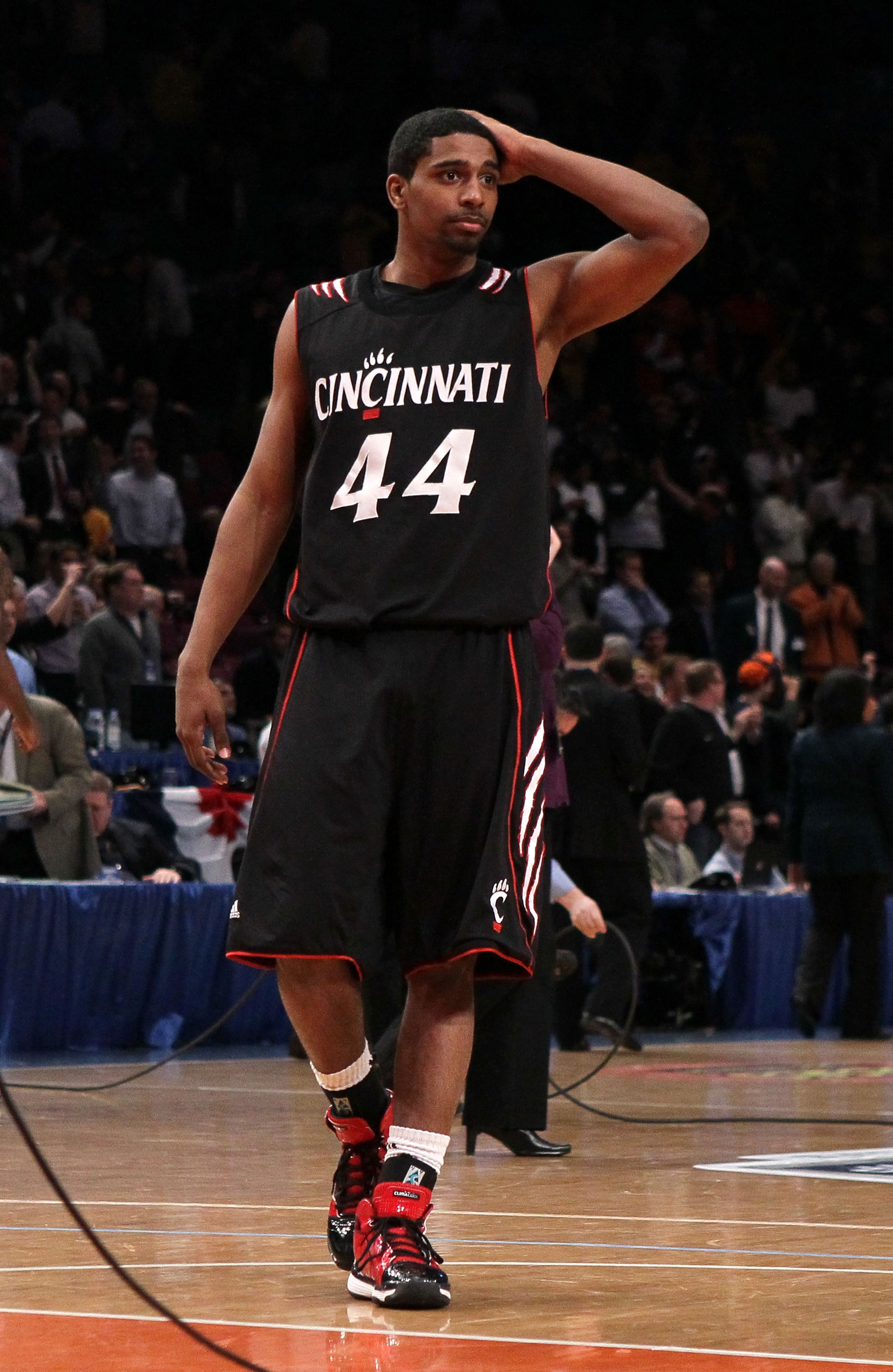 NEW YORK - MARCH 11: Jaquon Parker #44 of the Cincinnati Bearcats reacts after being defeated by the West Virginia Mountaineers during the quarterfinal of the 2010 NCAA Big East Tournament at Madison Square Garden on March 11, 2010 in New York City.  (Pho