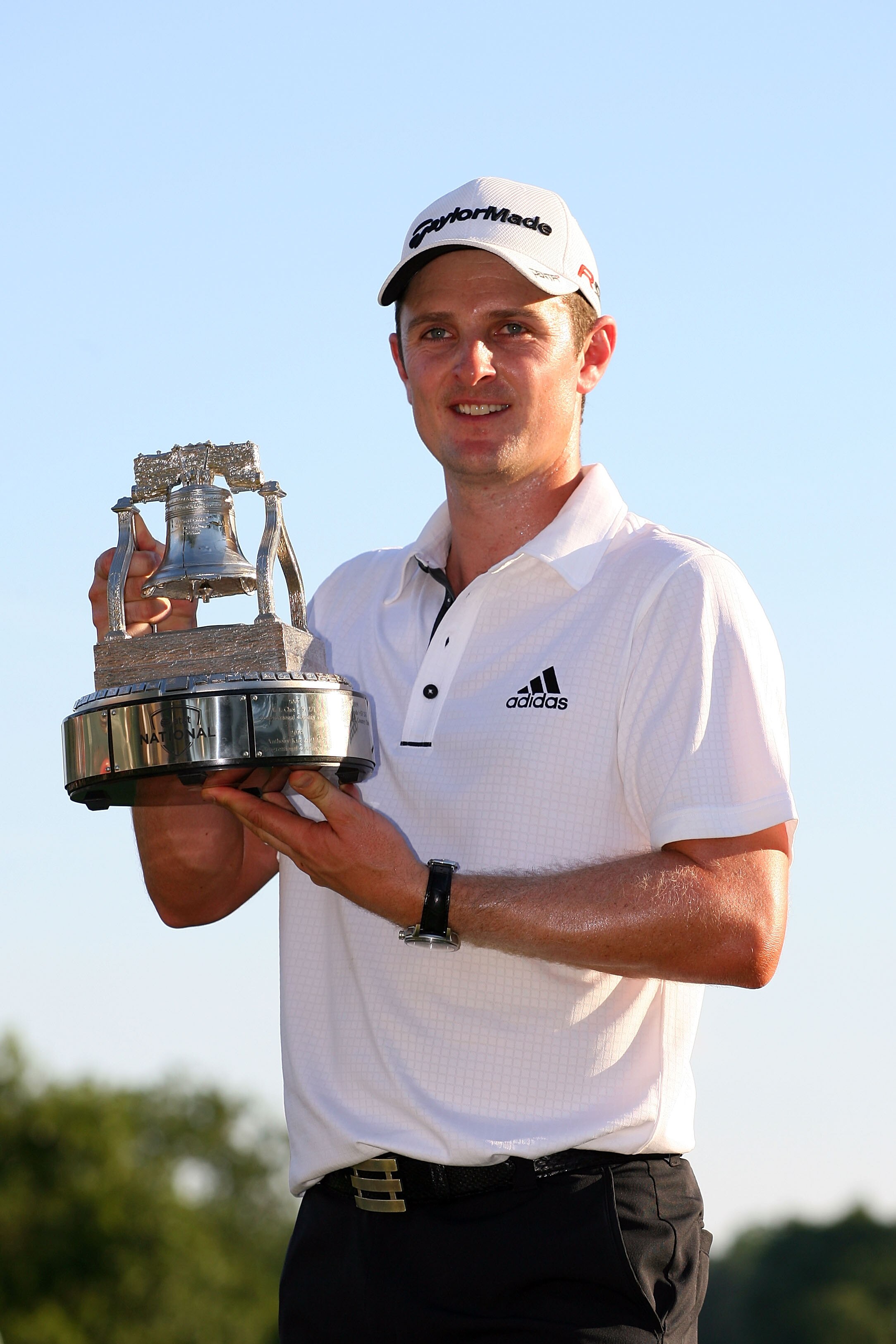 NEWTOWN SQUARE, PA - JULY 04:  Justin Rose of England celebrates with the AT&T National tournament trophy after he won the tournment following the final round of the AT&T National at Aronimink Golf Club on July 4, 2010 in Newtown Square, Pennsylvania.  (P