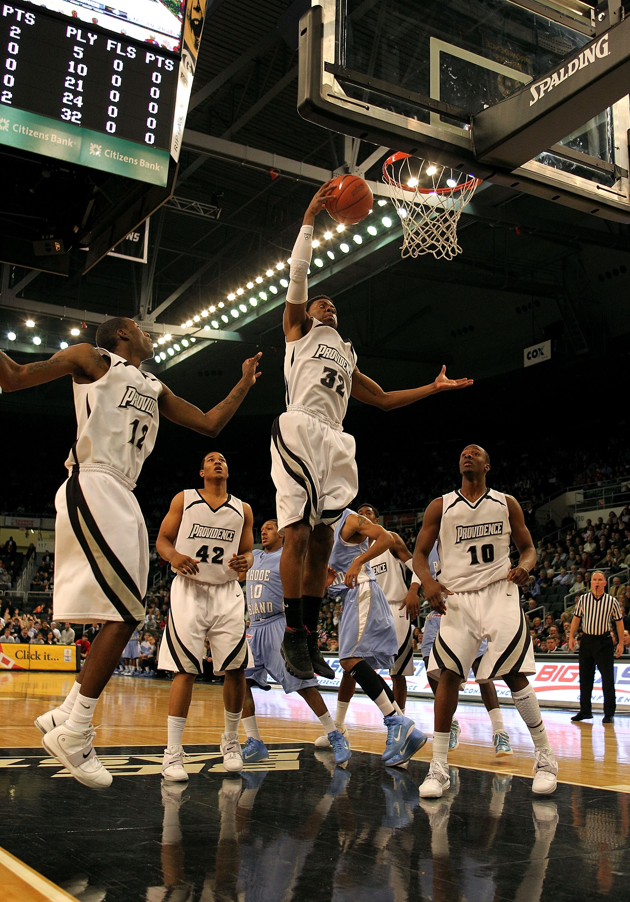 PROVIDENCE, RI - DECEMBER 04:  Vincent Council #32 of the Providence Friars controls a rebound against the Rhode Island Rams at the Dunkin' Donuts Center on December 4, 2010 in Providence, Rhode Island.  (Photo by Chris Chambers/Getty Images)