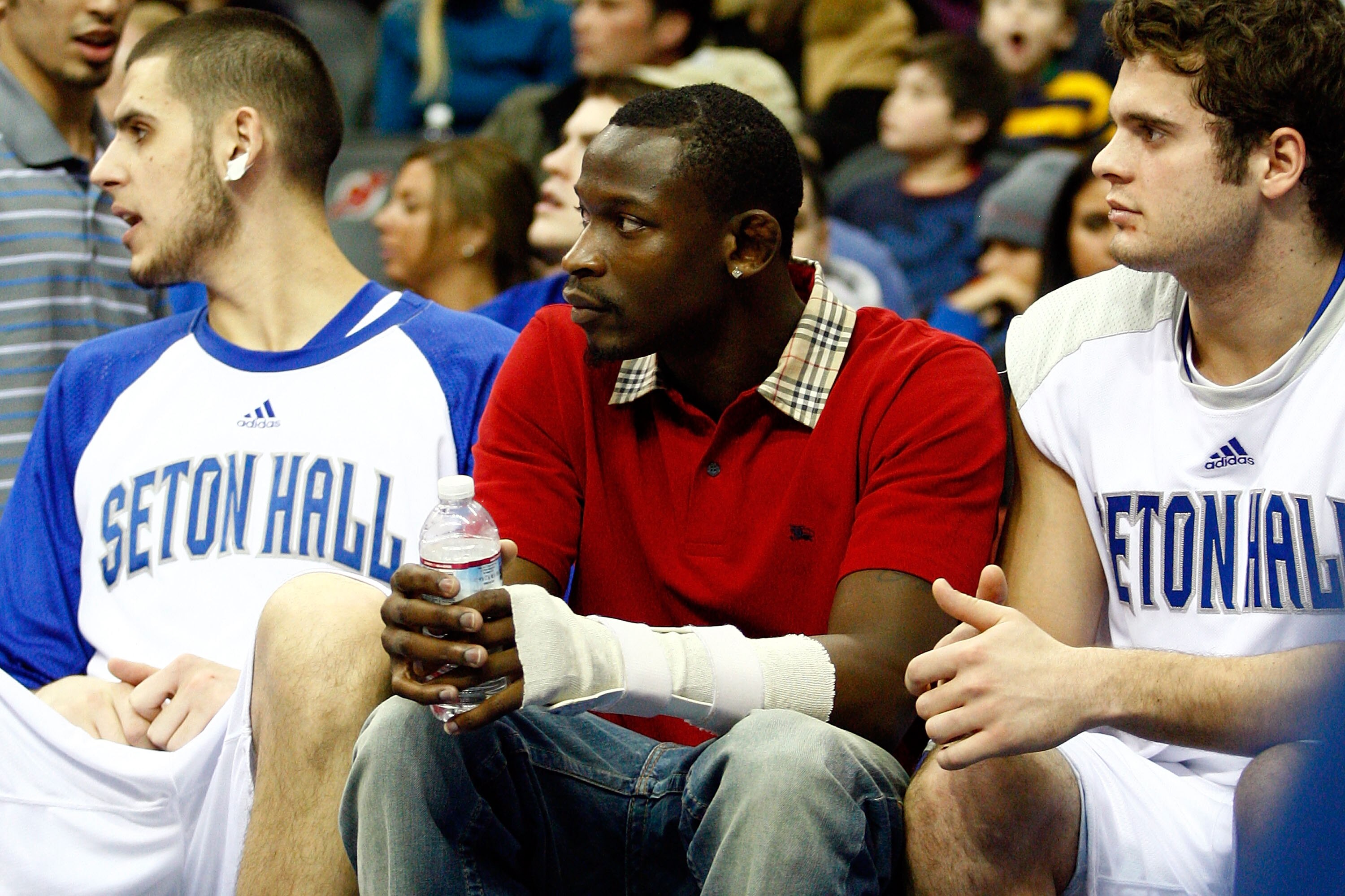 NEWARK, NJ - DECEMBER 22:  Injured guard Jeremy Hazell (C) of the Seton Hall Pirates looks on from the bench with hisleft wrist wrapped up against the Dayton Flyers at Prudential Center on December 22, 2010 in Newark, New Jersey. Dayton 69-65. (Photo by C