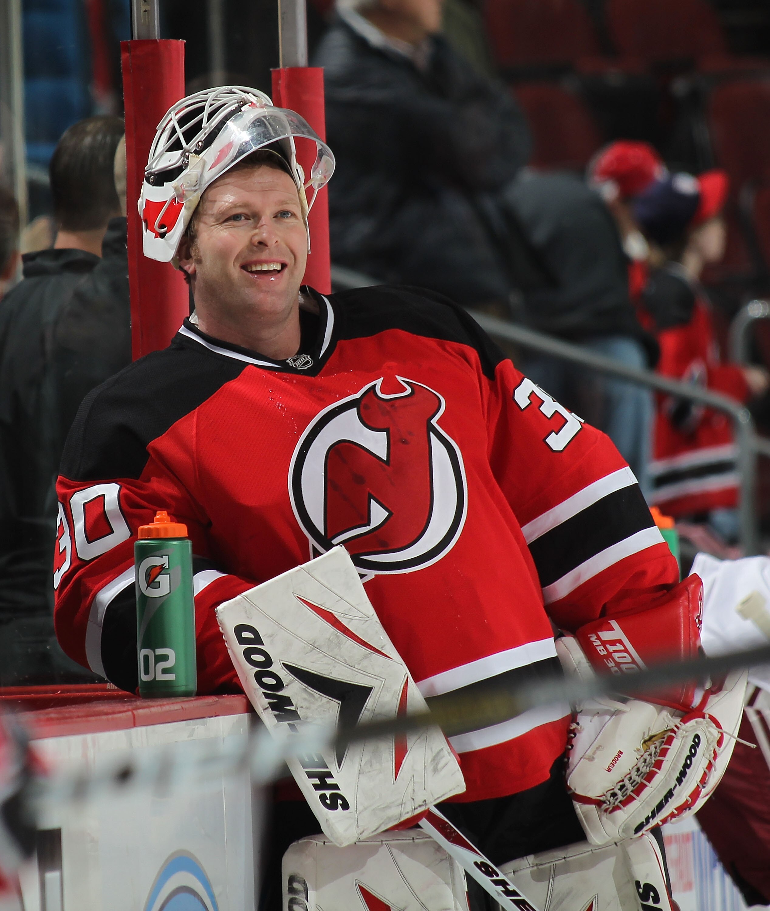 NEWARK, NJ - DECEMBER 15:  Goalie Martin Brodeur #30 of the New Jersey Devils enjoys a laugh during warmups before a hockey game against the Phoenix Coyotes at the Prudential Center on December 15, 2010 in Newark, New Jersey.  (Photo by Paul Bereswill/Get