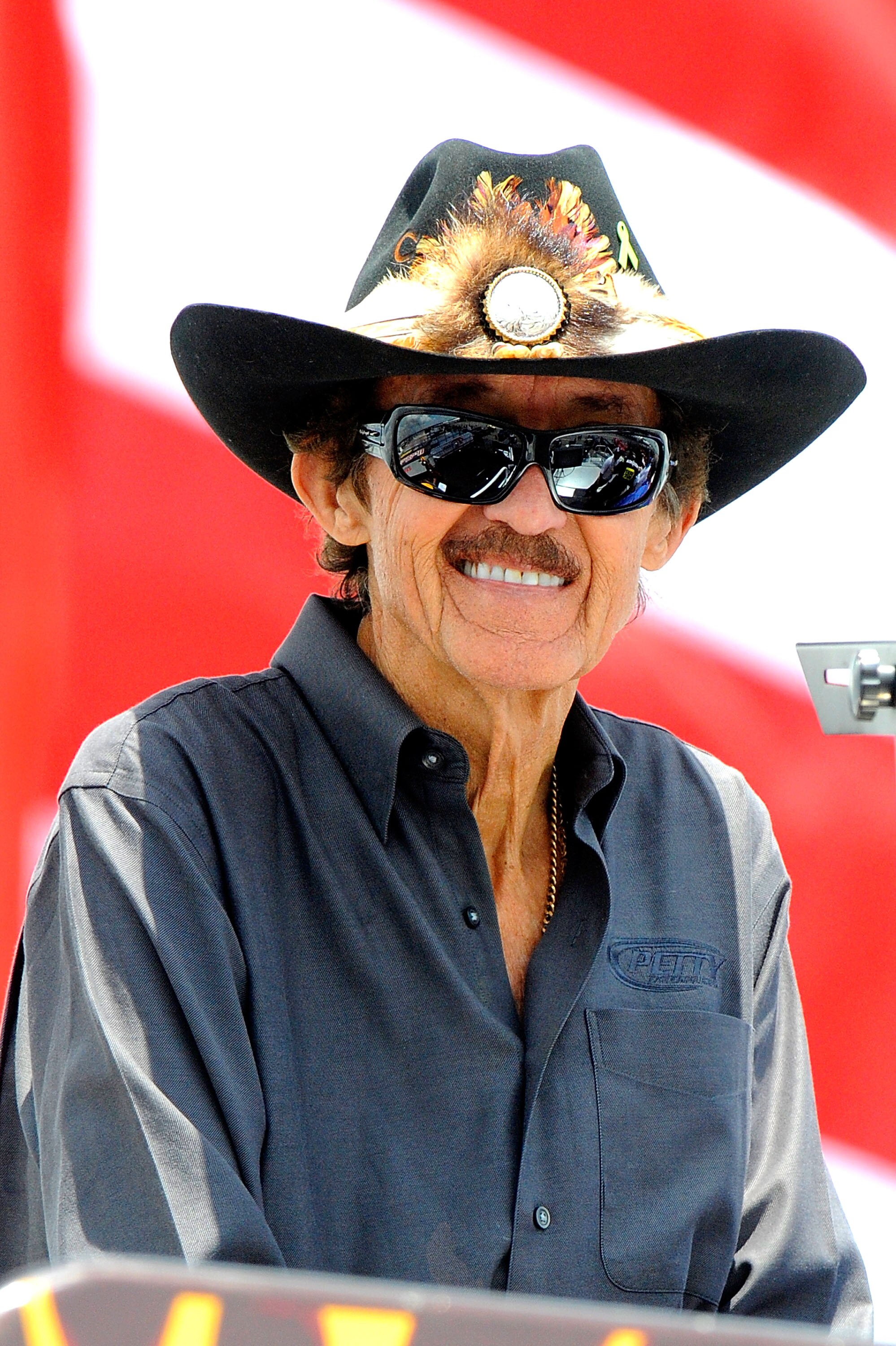 LONG POND, PA - JUNE 04:  NASCAR Hall of Famer Richard Petty watches practice for the NASCAR Sprint Cup Series Gillette Fusion ProGlide 500 at Pocono Raceway on June 4, 2010 in Long Pond, Pennsylvania.  (Photo by John Harrelson/Getty Images for NASCAR)