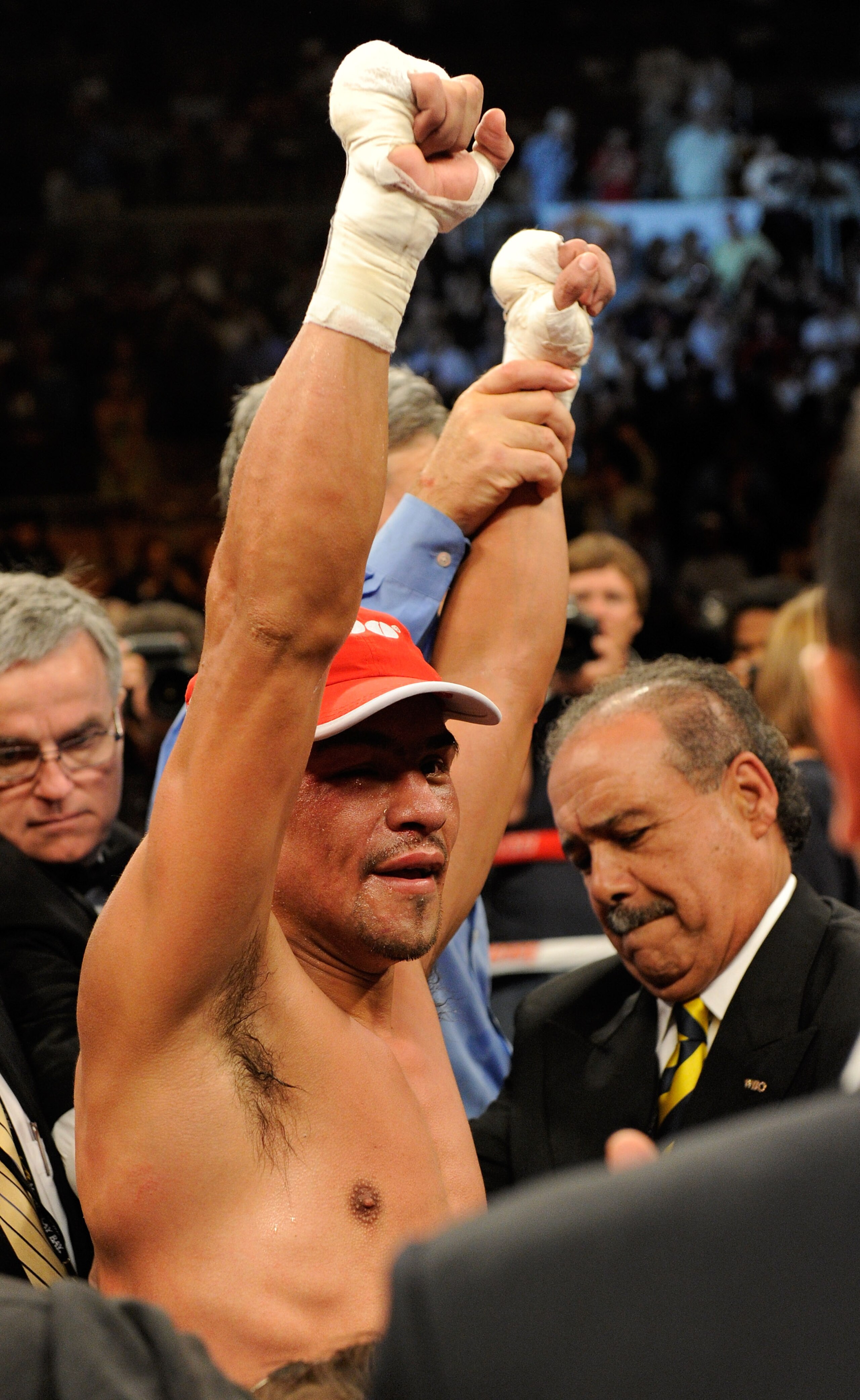 LAS VEGAS - JULY 31:  WBA/WBO lightweight champion Juan Manuel Marquez celebrates his unanimous-decison victory over Juan Diaz at the Mandalay Bay Events Center July 31, 2010 in Las Vegas, Nevada.  (Photo by Ethan Miller/Getty Images)
