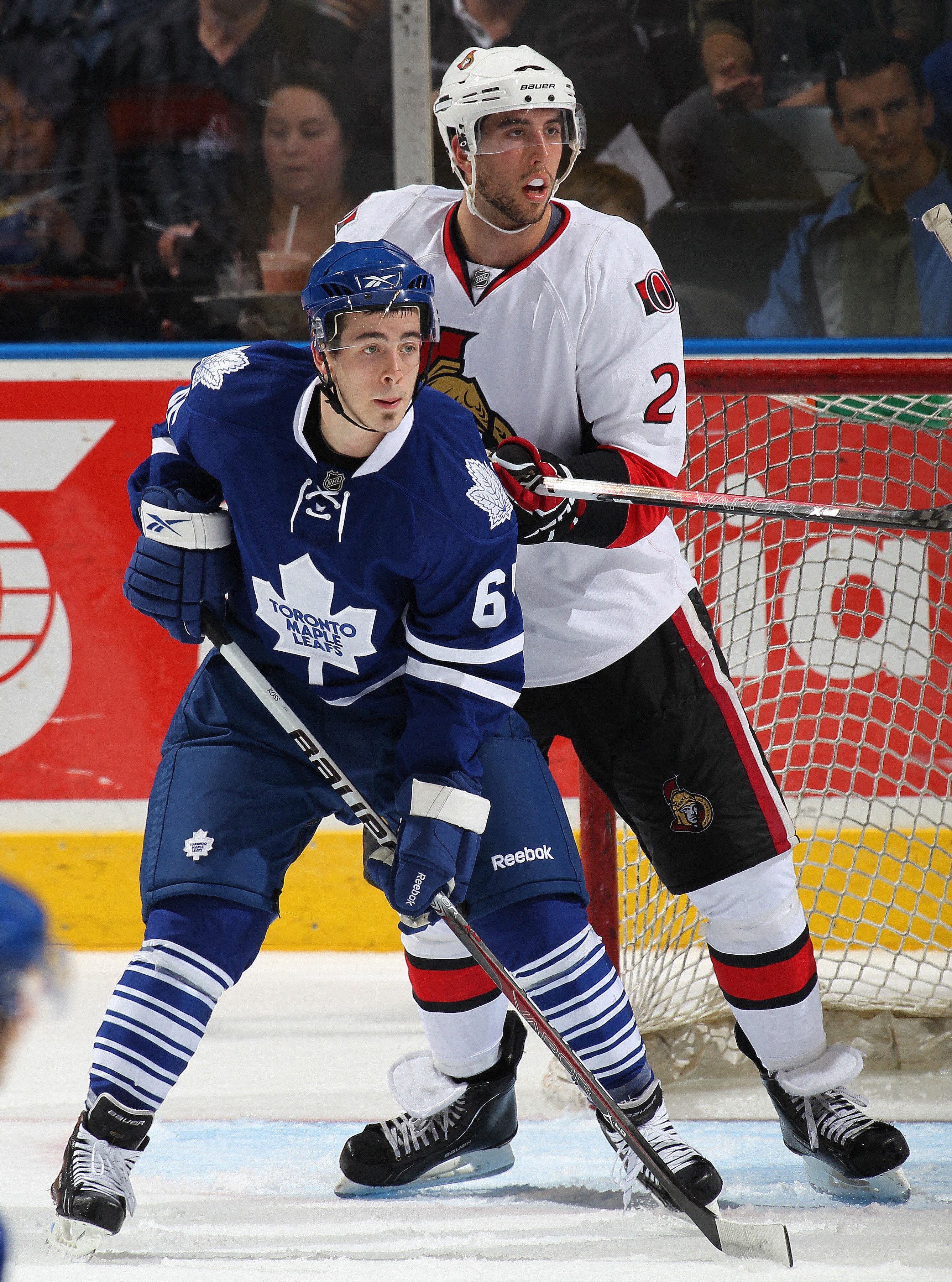 LONDON, CANADA - SEPTEMBER 14:  Bradley Ross #65 of the Toronto Maple Leafs battles with Jared Cowen #2 of the Ottawa Senators in a game during the NHL Rookie Tournament on September 14, 2010 at the John Labatt Centre in London, Ontario, Canada. (Photo by