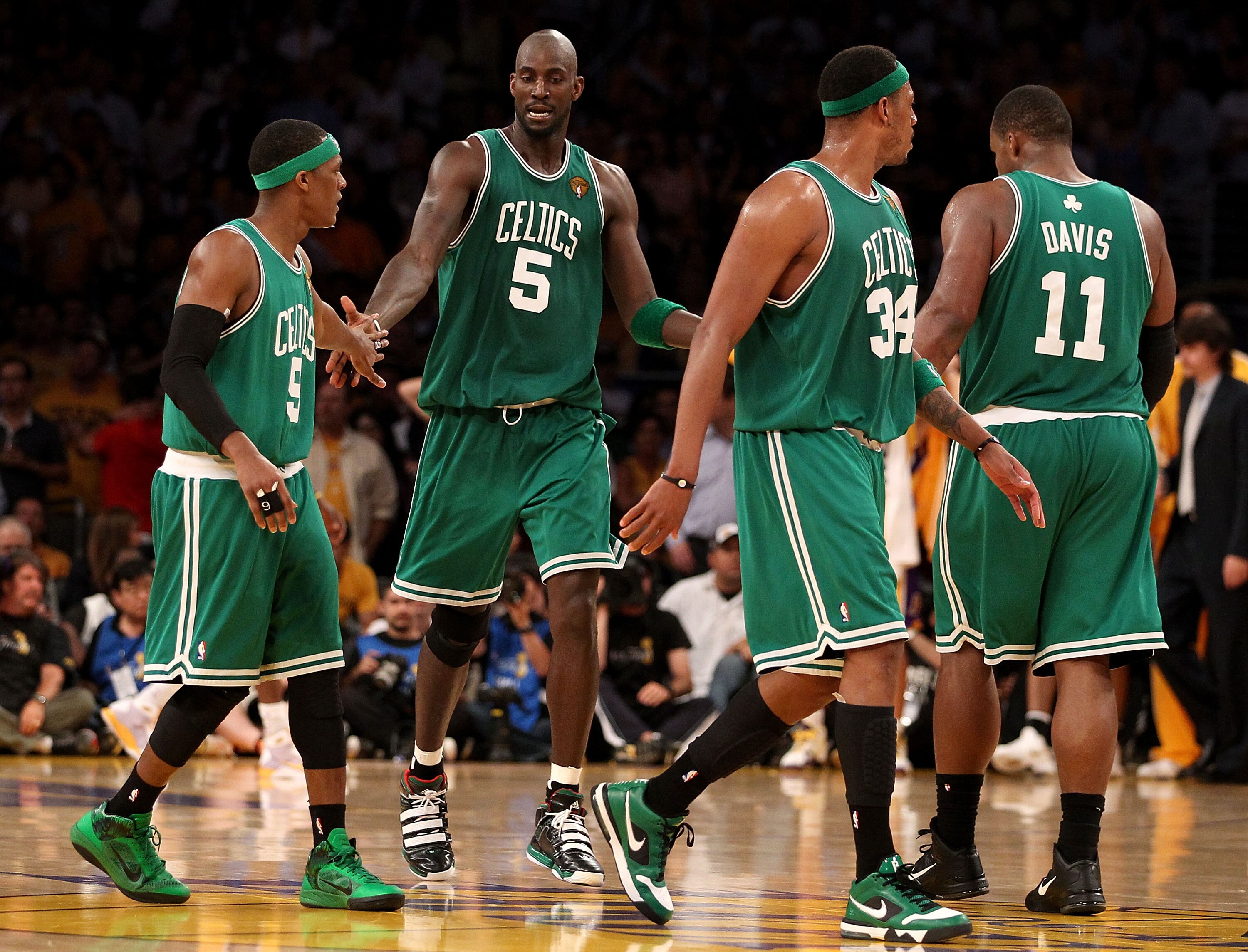 LOS ANGELES, CA - JUNE 17: (L-R) Rajon Rondo #9, Kevin Garnett #5, Paul Pierce #34 and Glen Davis #11 of the Boston Celtics walk across the court in the second half against the Los Angeles Lakers in Game Seven of the 2010 NBA Finals at Staples Center on LOS ANGELES, CA - JUNE 17: (L-R) Rajon Rondo #9, Kevin Garnett #5, Paul Pierce #34 and Glen Davis #11 of the Boston Celtics walk across the court in the second half against the Los Angeles Lakers in Game Seven of the 2010 NBA Finals at Staples Center on