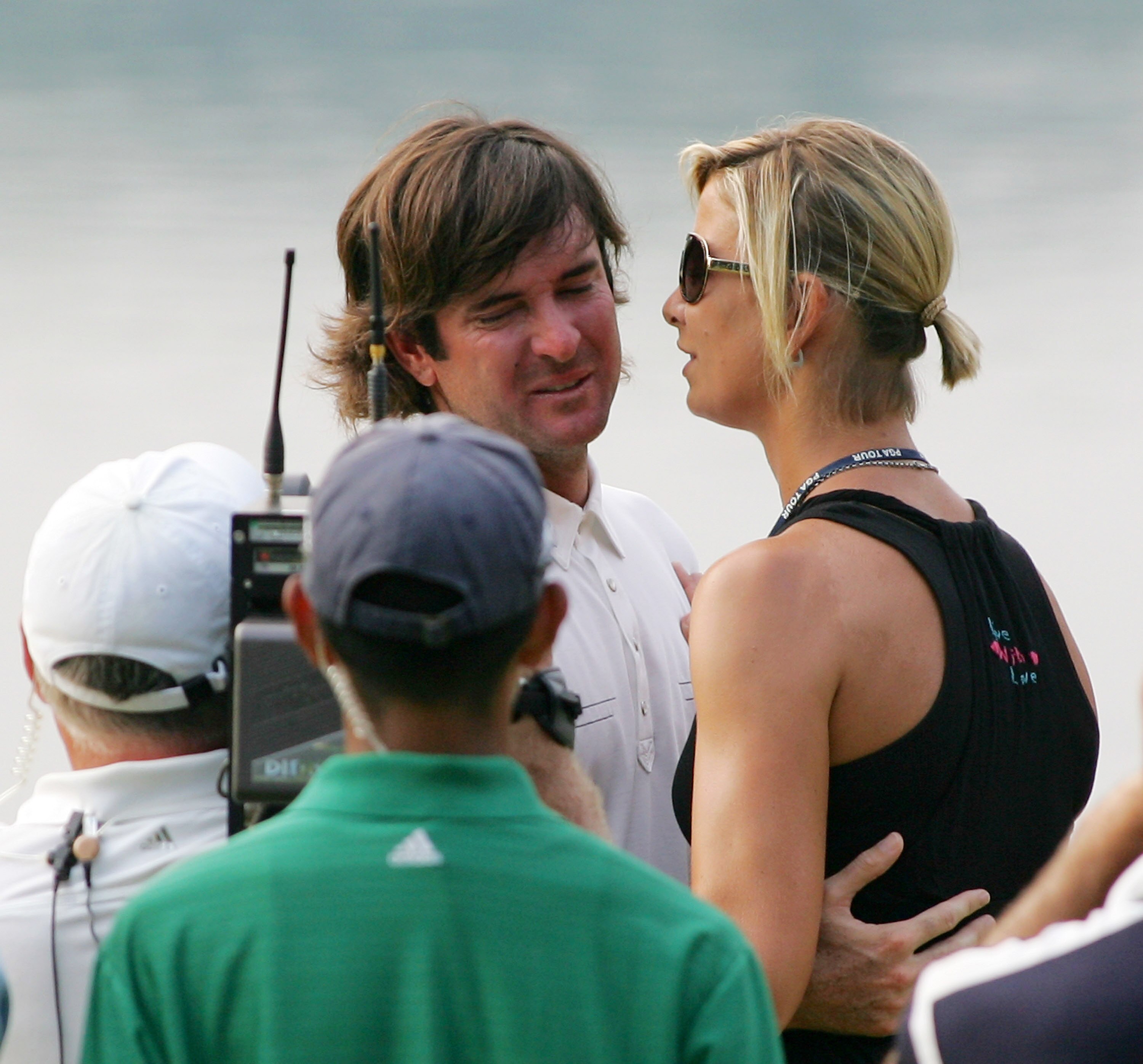 CROMWELL, CT - JUNE 27:  Bubba Watson embraces his wife Angie Watson after winning a two-hole playoff on the 16th green after the final round of the Travelers Championship held at TPC River Highlands on June 27, 2010 in Cromwell, Connecticut.  (Photo by M