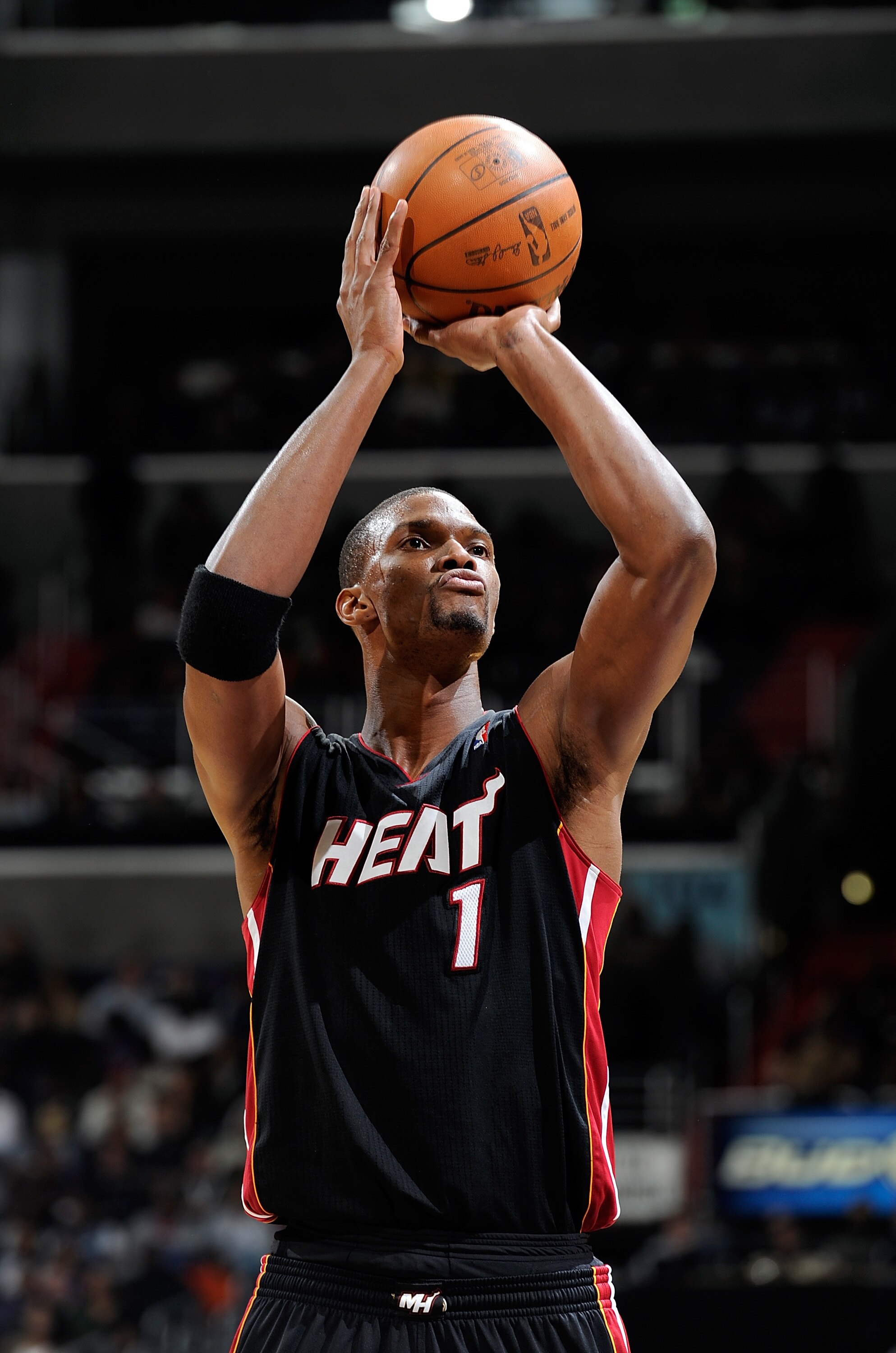 WASHINGTON, DC - DECEMBER 18: Chris Bosh #1 of the Miami Heat shoots a free throw against the Washington Wizards at the Verizon Center on December 18, 2010 in Washington, DC. NOTE TO USER: User expressly acknowledges and agrees that, by downloading and o WASHINGTON, DC - DECEMBER 18: Chris Bosh #1 of the Miami Heat shoots a free throw against the Washington Wizards at the Verizon Center on December 18, 2010 in Washington, DC. NOTE TO USER: User expressly acknowledges and agrees that, by downloading and o