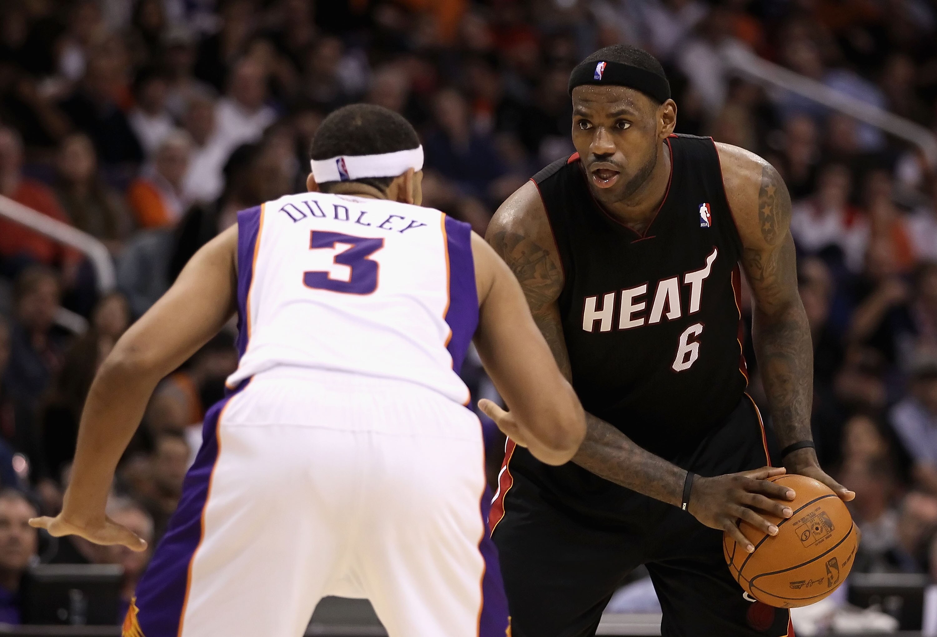 PHOENIX - DECEMBER 23: LeBron James #6 of the Miami Heat looks to pass around Jared Dudley #3 of the Phoenix Suns during the NBA game at US Airways Center on December 23, 2010 in Phoenix, Arizona. The Heat defeated the Suns 95-83. NOTE TO USER: User exp PHOENIX - DECEMBER 23: LeBron James #6 of the Miami Heat looks to pass around Jared Dudley #3 of the Phoenix Suns during the NBA game at US Airways Center on December 23, 2010 in Phoenix, Arizona. The Heat defeated the Suns 95-83. NOTE TO USER: User exp