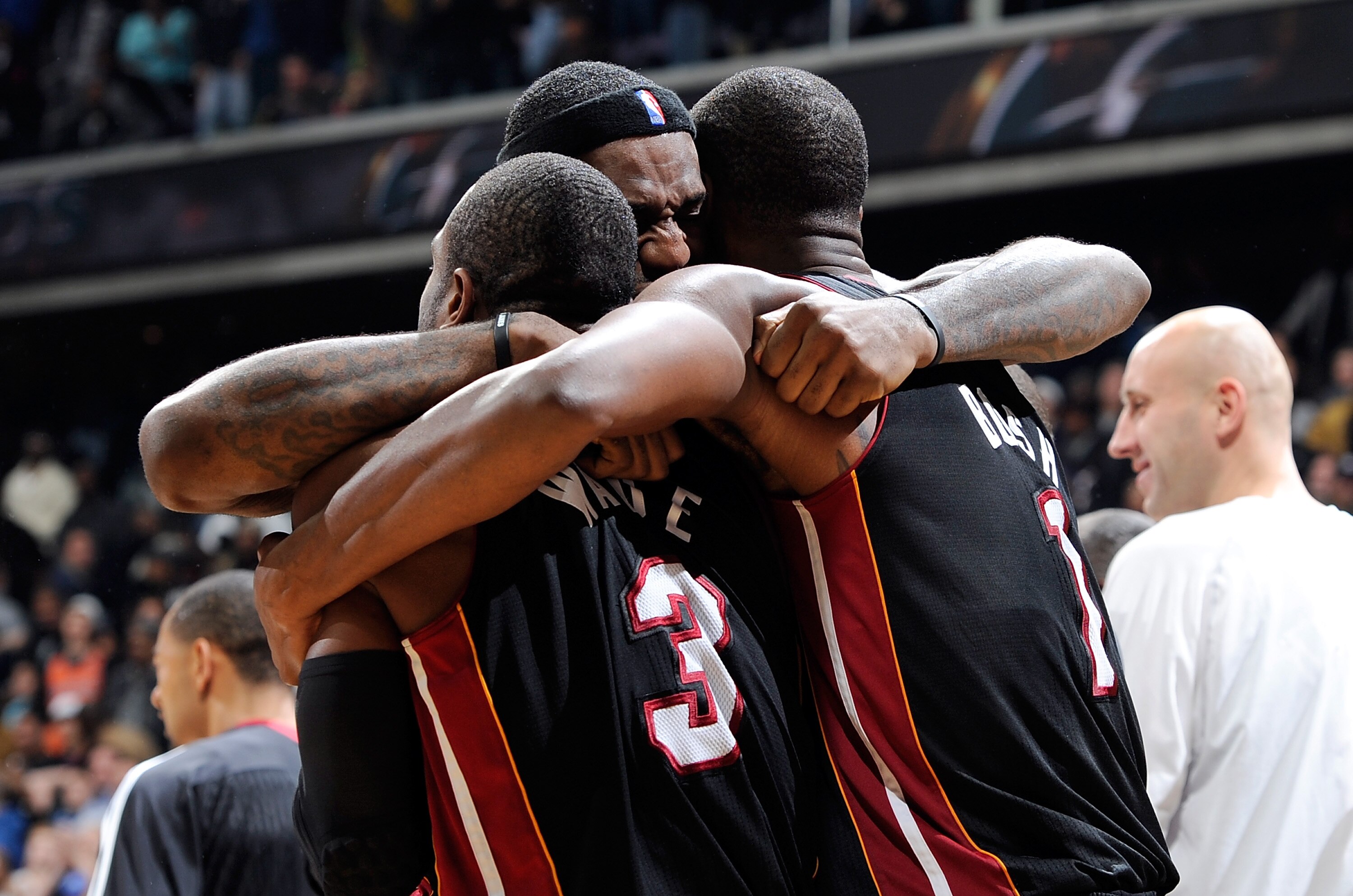 WASHINGTON, DC - DECEMBER 18: LeBron James #6 of the Miami Heat celebrates with Dwyane Wade #3 and Chris Bosh #1 after a 95-94 victory over the Washington Wizards at the Verizon Center on December 18, 2010 in Washington, DC. NOTE TO USER: User expressly WASHINGTON, DC - DECEMBER 18: LeBron James #6 of the Miami Heat celebrates with Dwyane Wade #3 and Chris Bosh #1 after a 95-94 victory over the Washington Wizards at the Verizon Center on December 18, 2010 in Washington, DC. NOTE TO USER: User expressly
