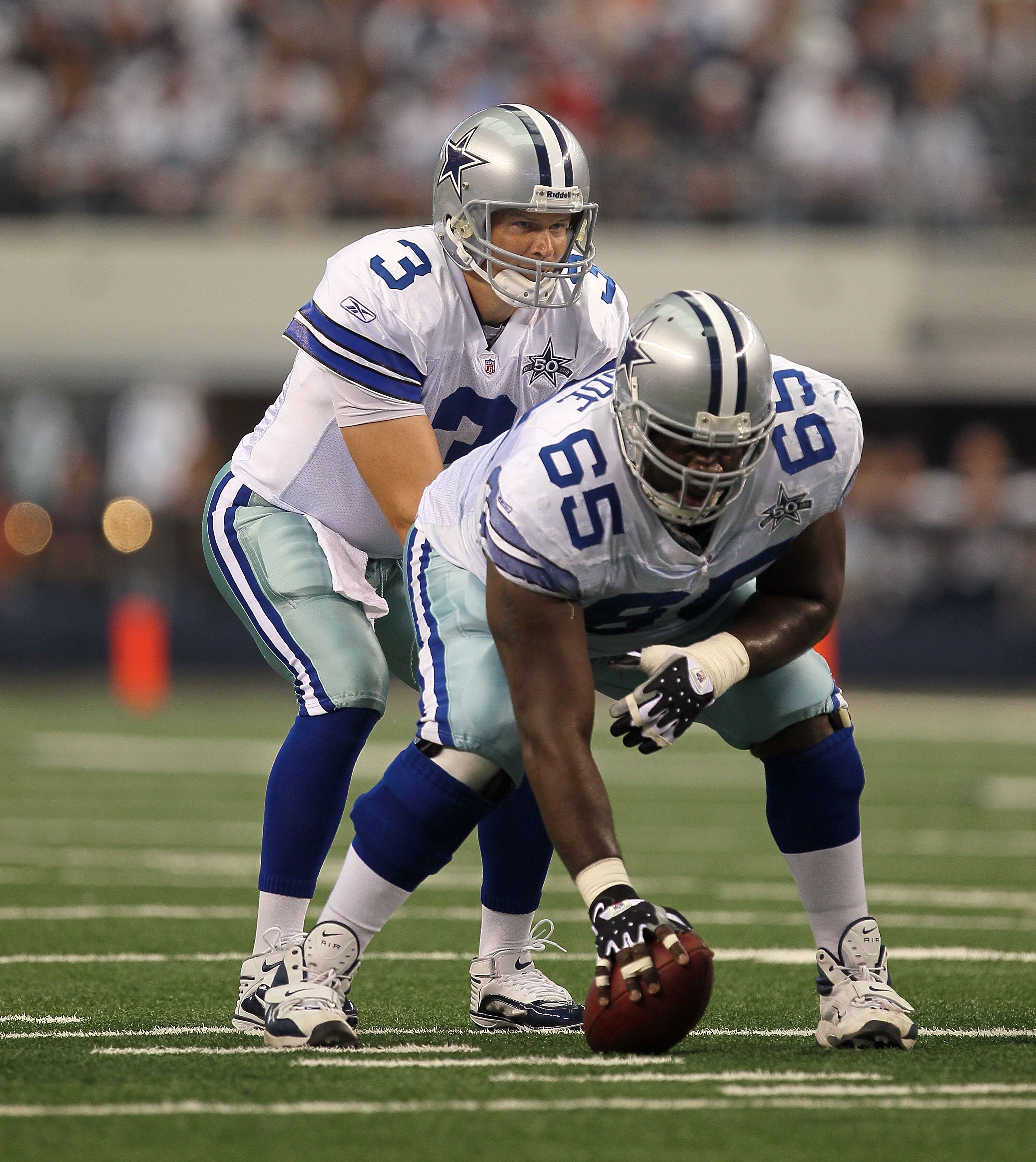 ARLINGTON, TX - OCTOBER 31:  Quarterback Jon Kitna #3 of the Dallas Cowboys calls signals at the line of scrimmage as he stands under center Andre Gurode #65 against the Jacksonville Jaguars at Cowboys Stadium on October 31, 2010 in Arlington, Texas.  (Ph