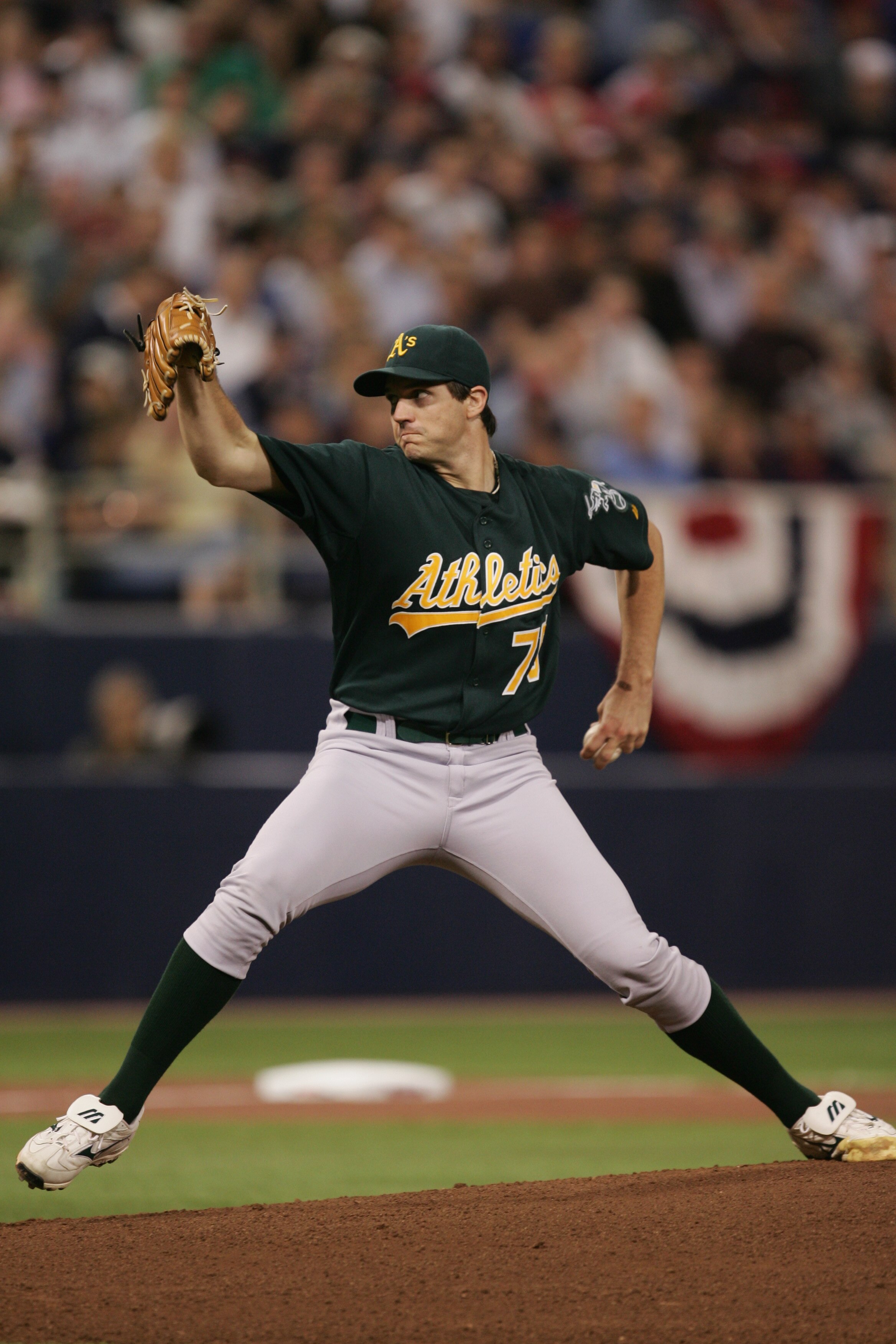 MINNEAPOLIS - OCTOBER 3:  Barry Zito #75 of the Oakland Athletics pitches against the Minnesota Twins in Game One of the American League Division Series at the Hubert H. Humphrey Metrodome on October 3, 2006 in Minneapolis, Minnesota. The A's won 3-2.  (P