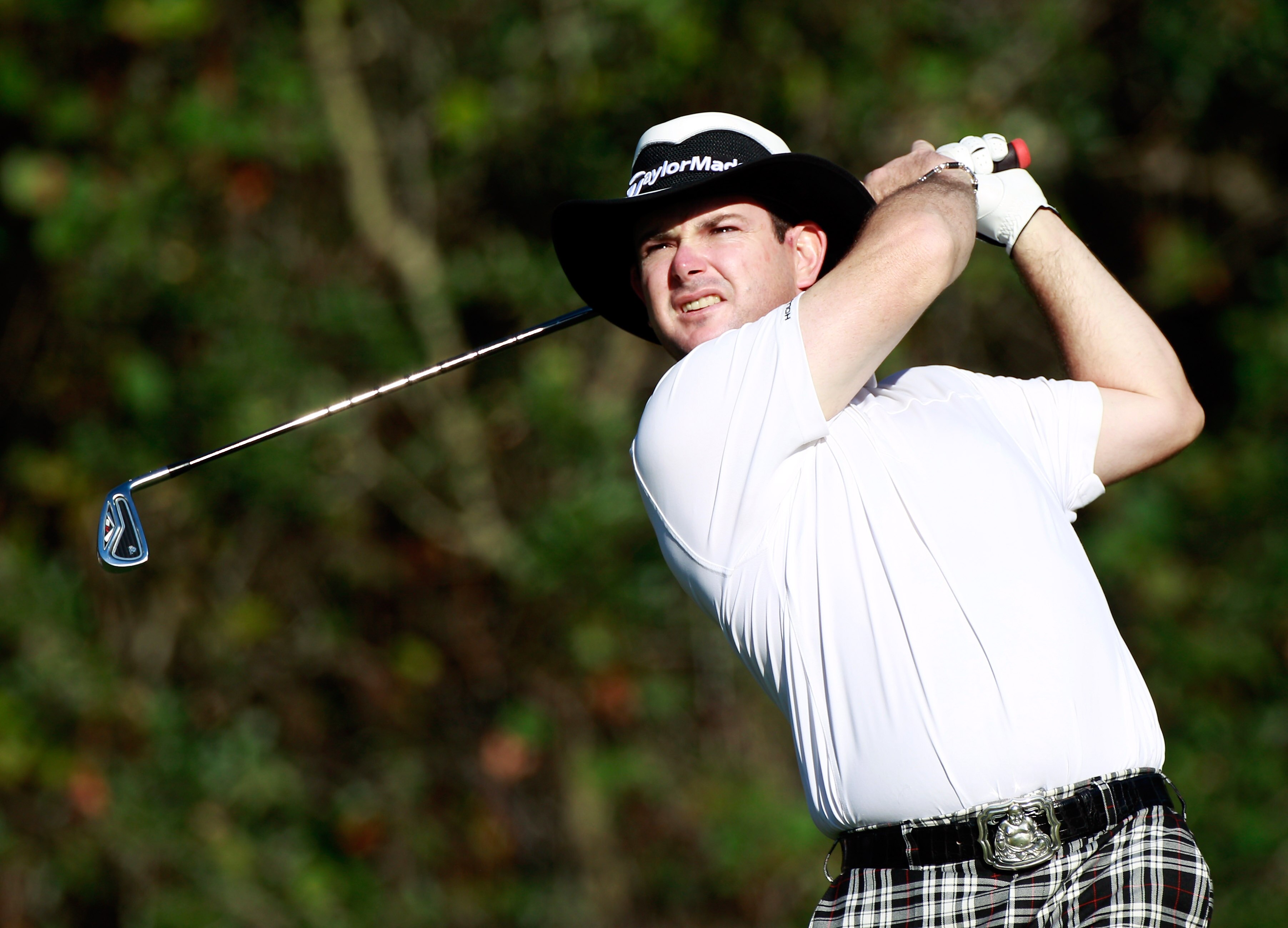 LAKE BUENA VISTA, FL - NOVEMBER 11:  Rory Sabbatini of South Africa plays a shot on the 13th hole during the first round of the Children's Miracle Network Classic at the Disney Palm and Magnolia courses on November 11, 2010 in Lake Buena Vista, Florida.