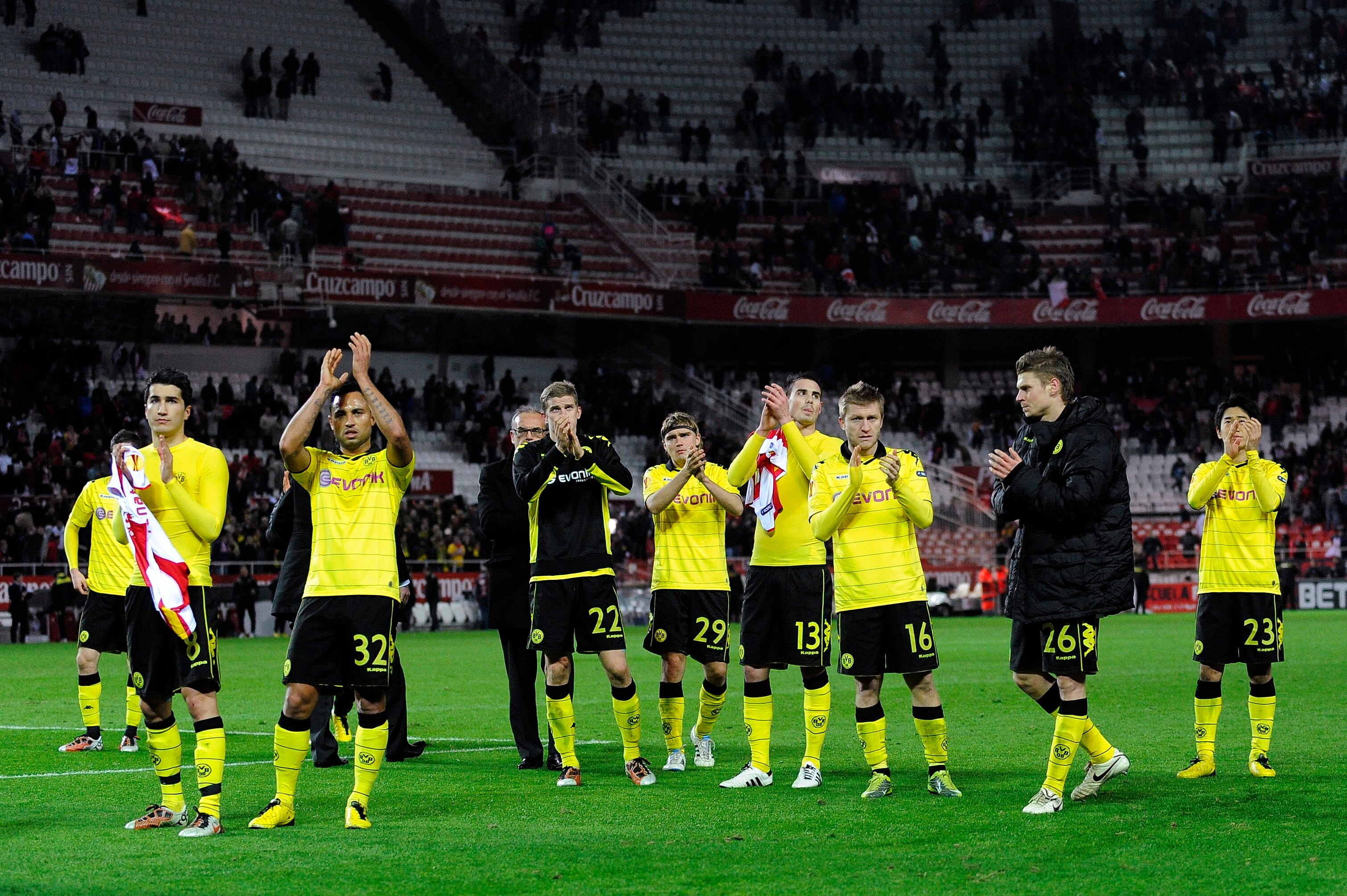 SEVILLE, SPAIN - DECEMBER 15: Borussi Dortmund players acknowledge  fans at the end of the UEFA Europa League group J match between Sevilla and Borussia Dortmund at Estadio Ramon Sanchez Pizjuan on December 15, 2010 in Seville, Spain. The match ended 2-2.