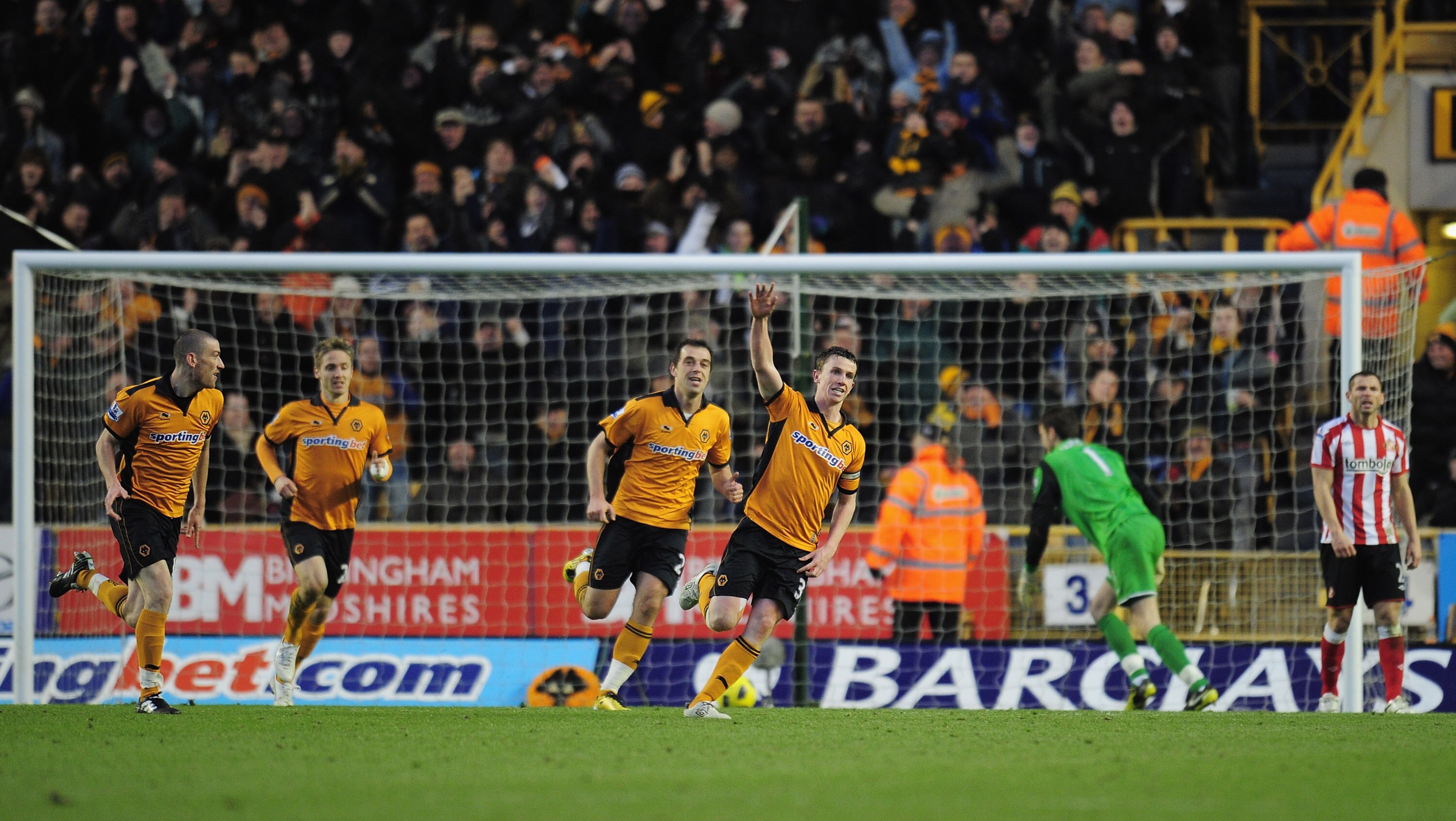 WOLVERHAMPTON, ENGLAND - NOVEMBER 27:  Kevin Foley of Wolverhampton Wanderers celebrates after scoring during the Barclays Premier League match between Wolverhampton Wanderers and Sunderland at Molineux on November 27, 2010 in Wolverhampton, England.  (Ph